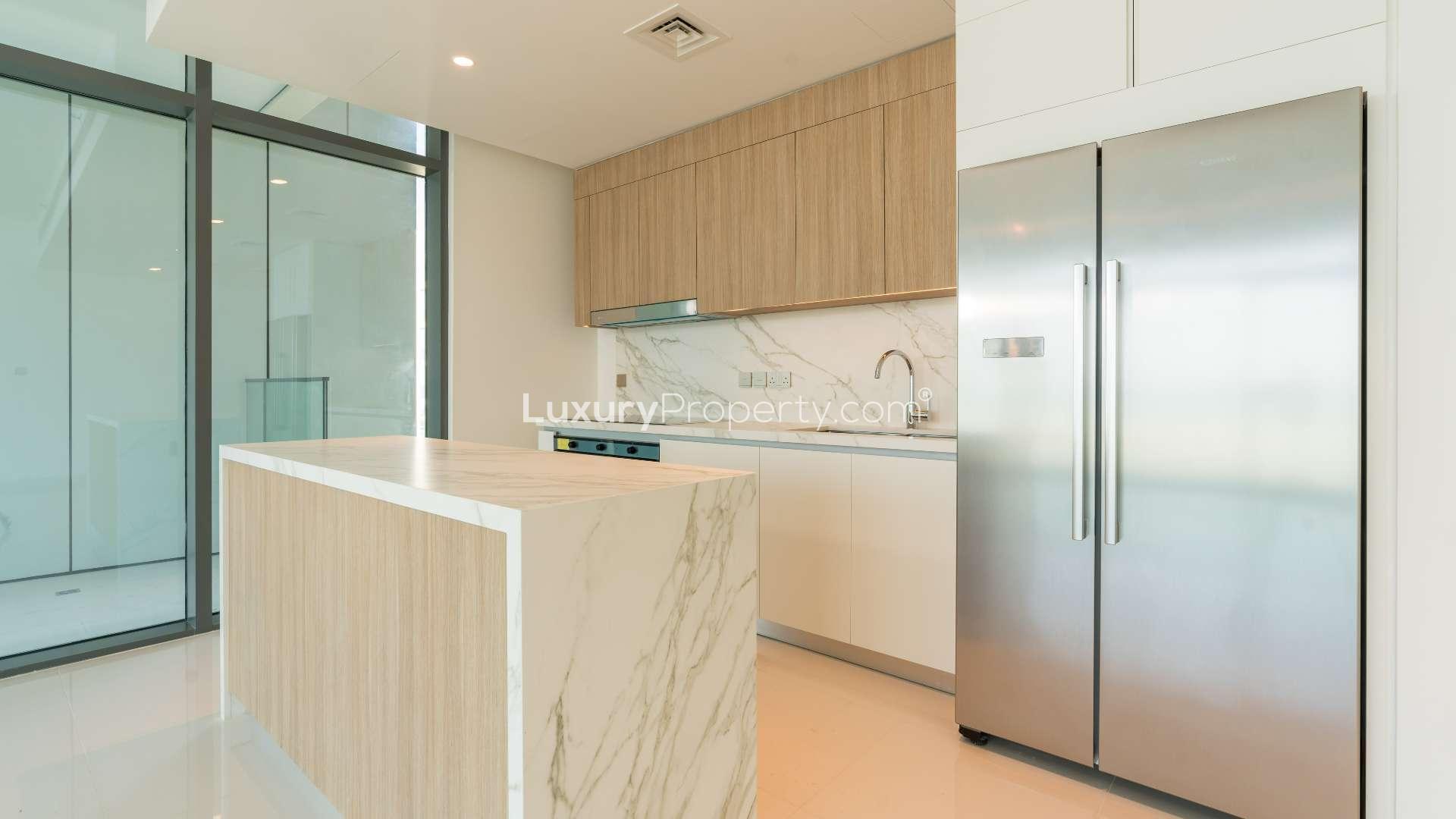 Balcony view from luxurious 3-bedroom apartment in Emaar Beachfront, Dubai Harbour, overlooking the sea