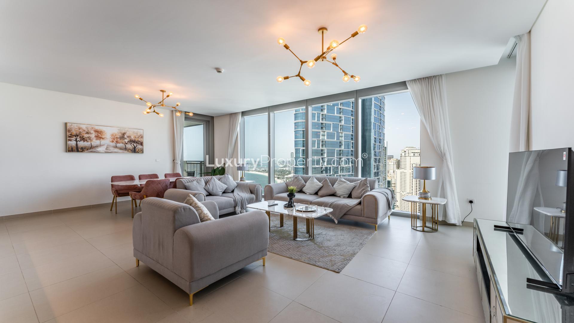 Luxurious living room with city view in Dubai Marina's 3-bedroom apartment for rent
