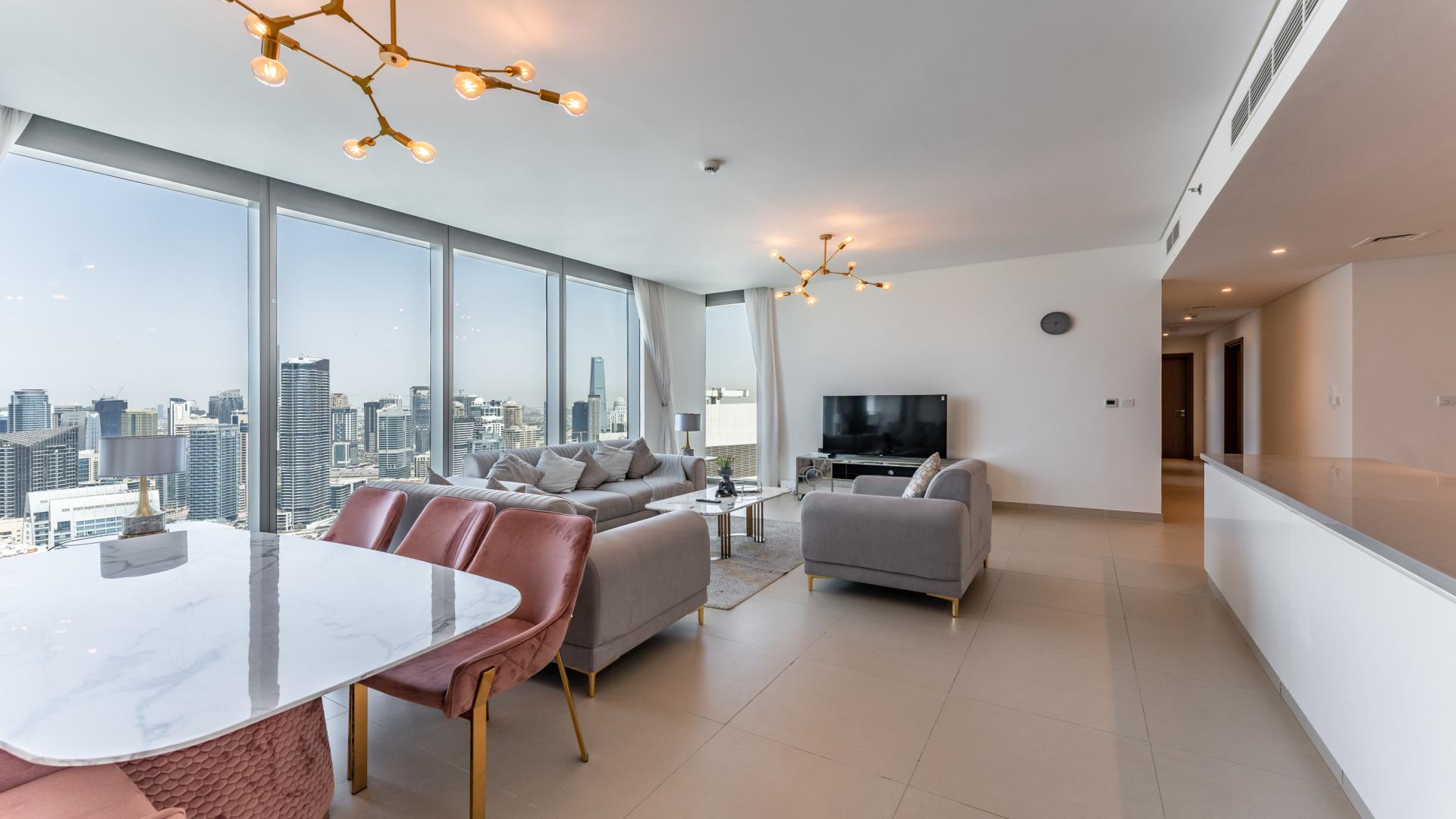 Luxurious Dubai Marina apartment balcony view of city skyline and waterfront in 5242 community