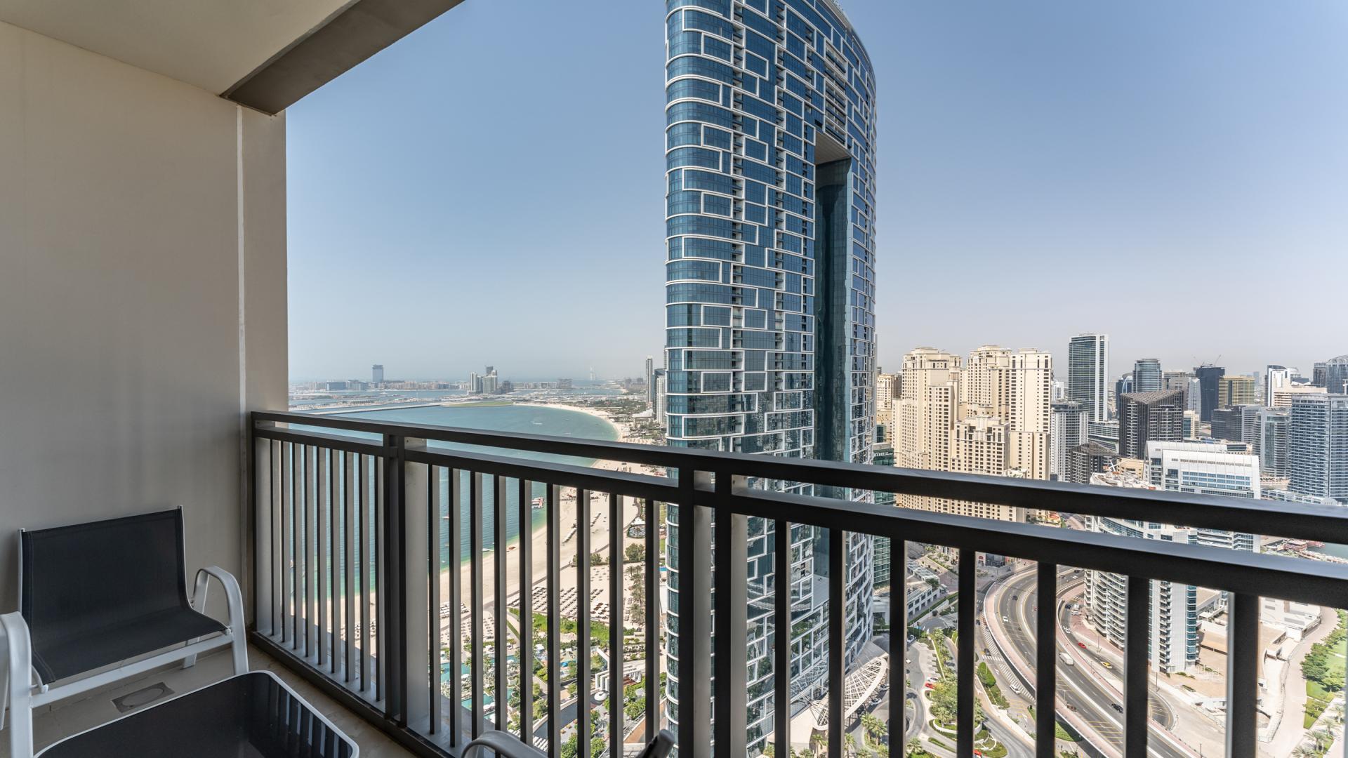 Luxurious living room with sea view in Dubai Marina 5242 community apartment