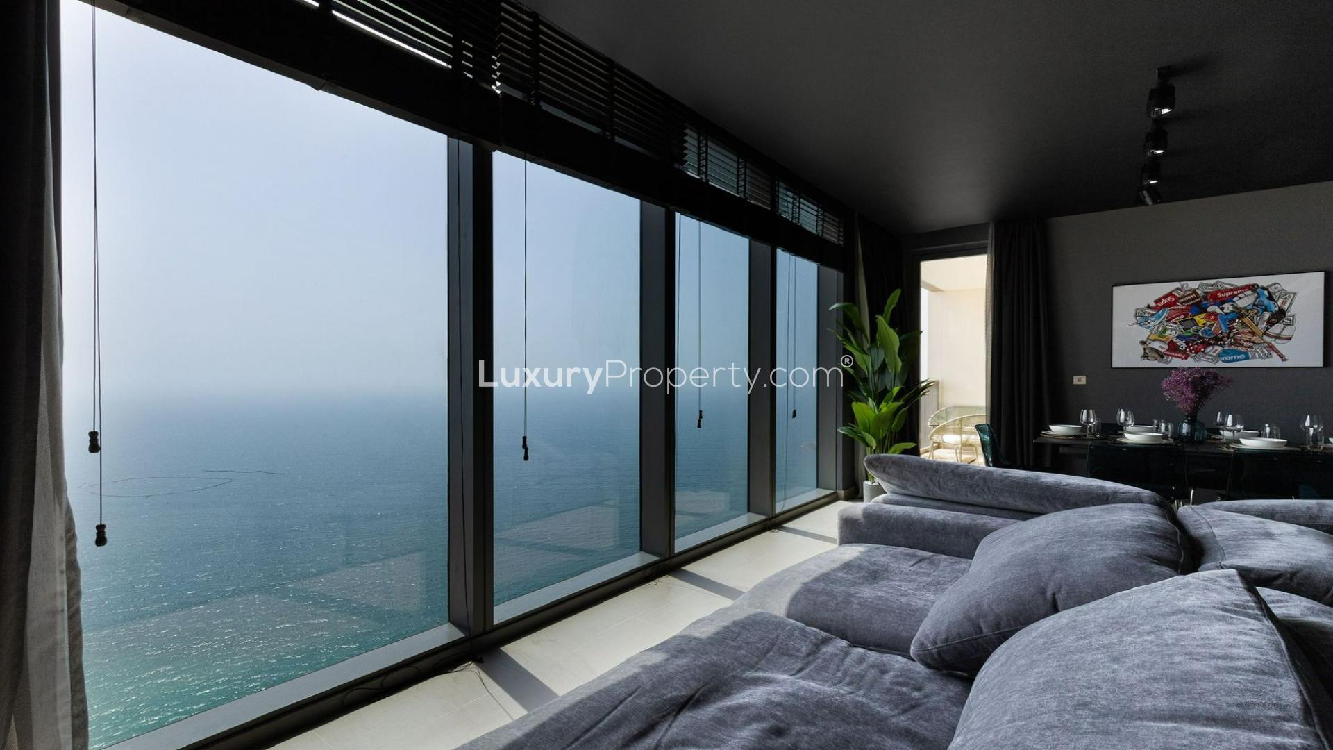 Luxurious Dubai Marina apartment interior with stunning marina views through large windows