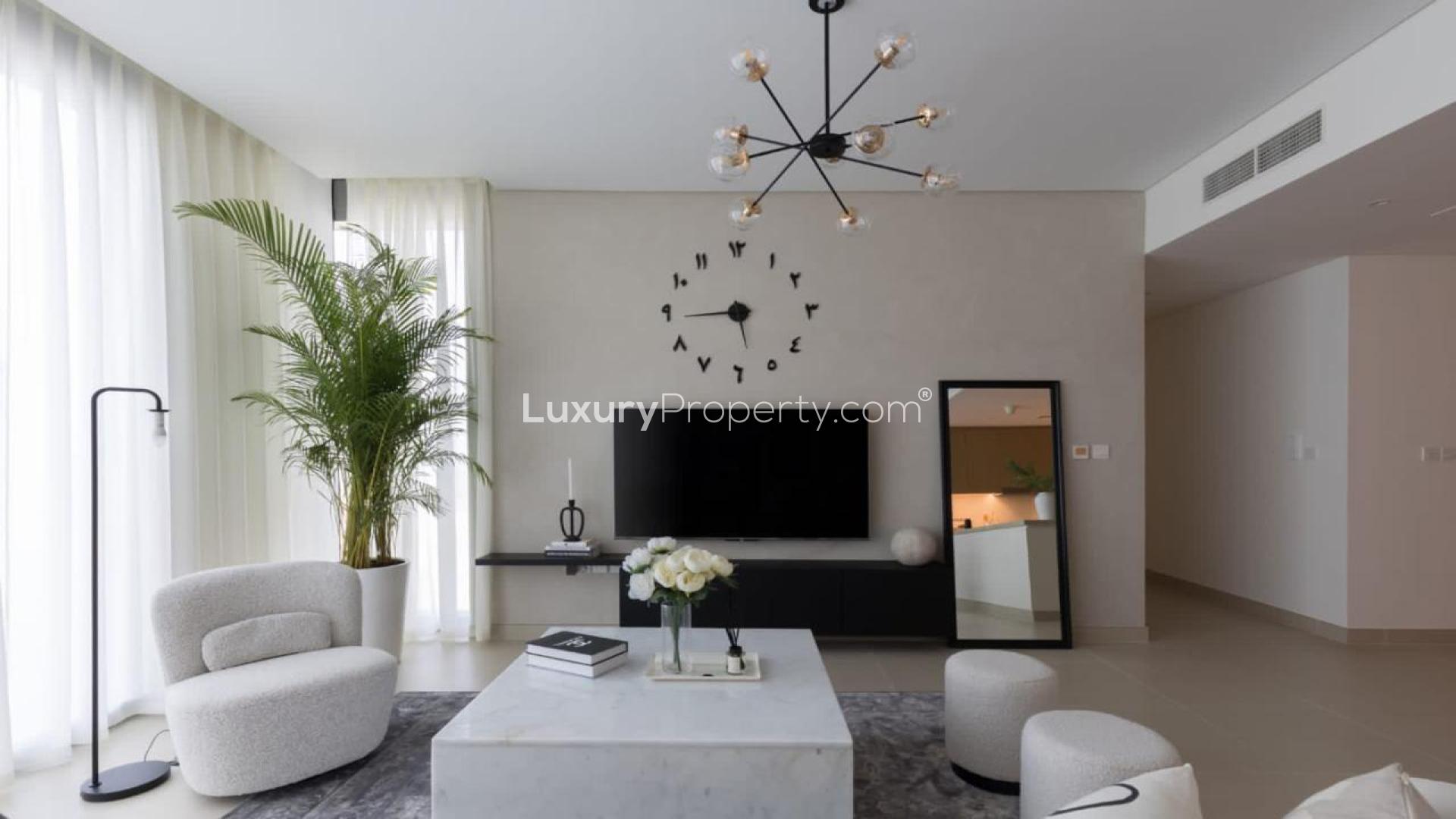 Modern living room in Marsa Dubai apartment, featuring elegant decor and natural light