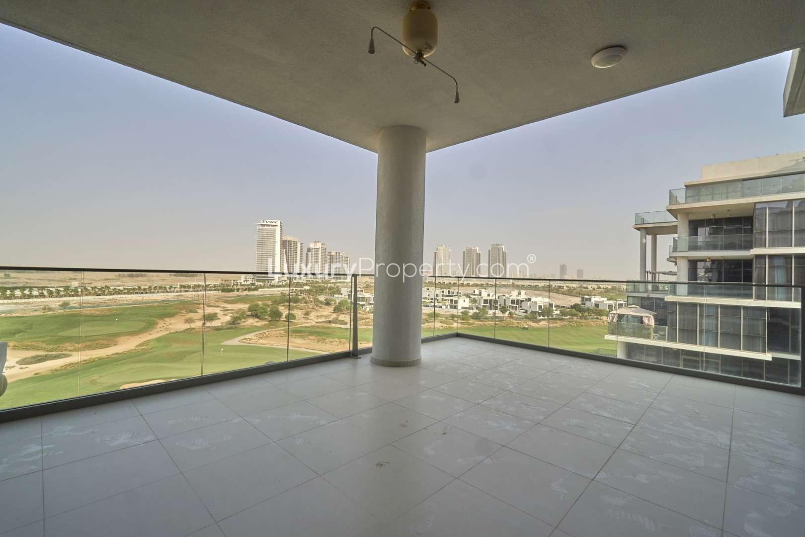 Hallway view in elegant Damac Hills apartment, showing bedroom and bathroom entrances