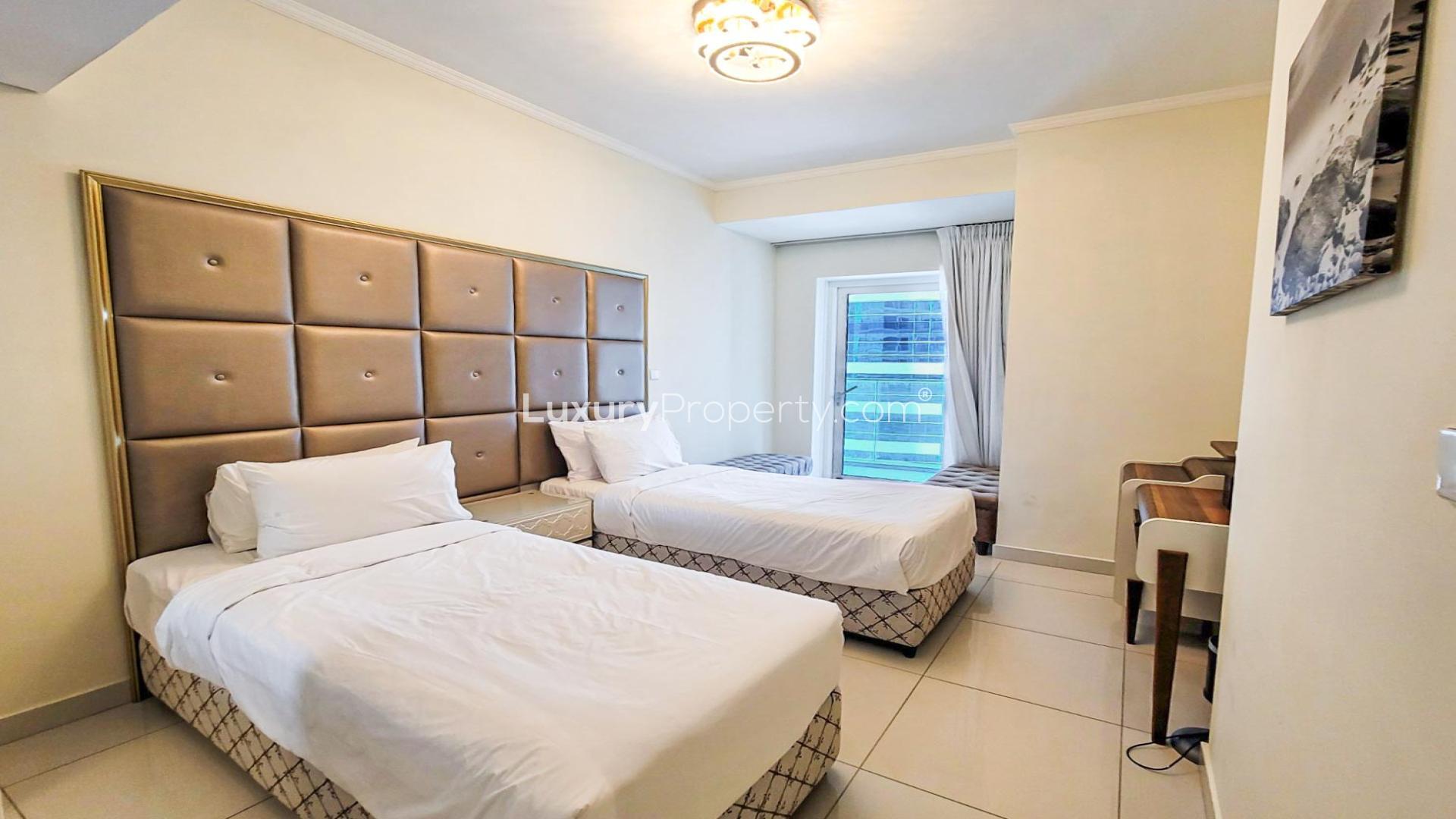 Furnished living room in Damac Heights apartment, Dubai Marina, with modern decor and amenities