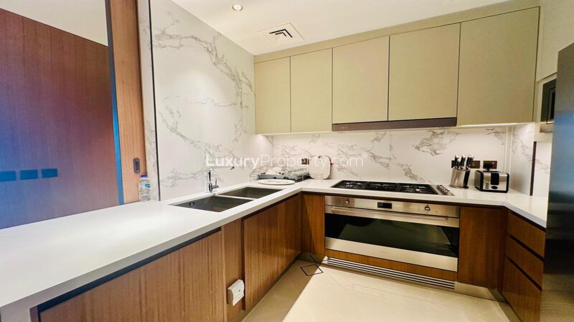 High-floor apartment living room with city views, modern decor, Downtown Dubai, The Address Residences