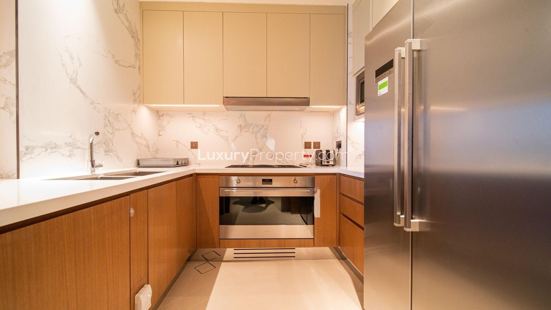 Modern living and dining area in luxury Downtown Dubai apartment, The Address Residences Dubai Opera