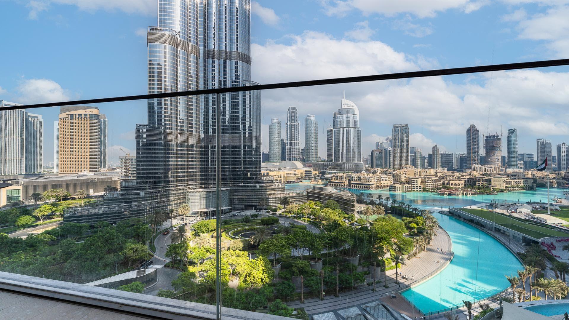 Modern living room in 3-bedroom apartment, The Address Residences Downtown Dubai, with city views