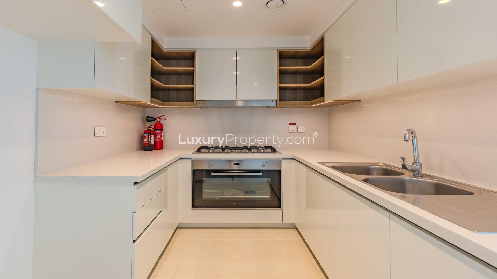 Bright, spacious living room in 3-bedroom apartment, Downtown Views II, Downtown Dubai