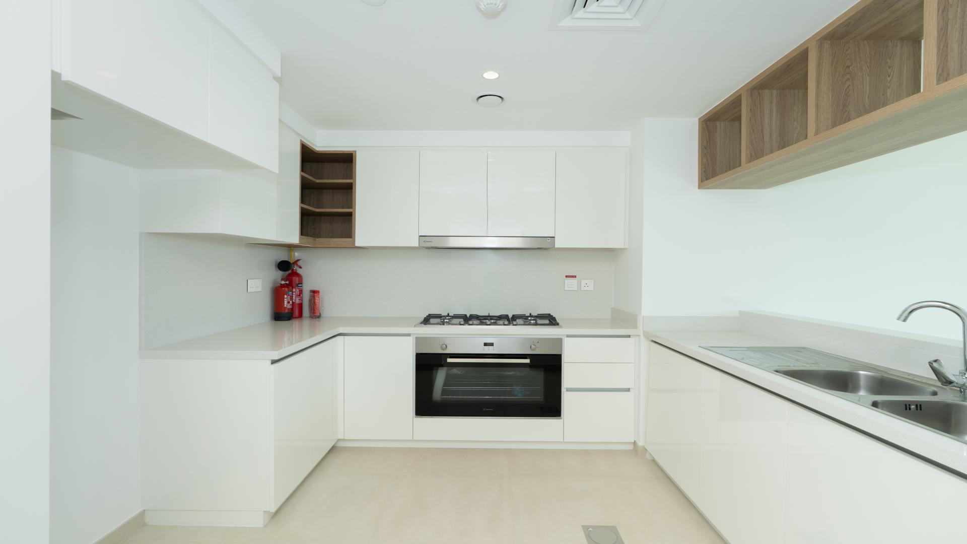 Spacious living area with large windows in Downtown Views II, Dubai apartment for rent