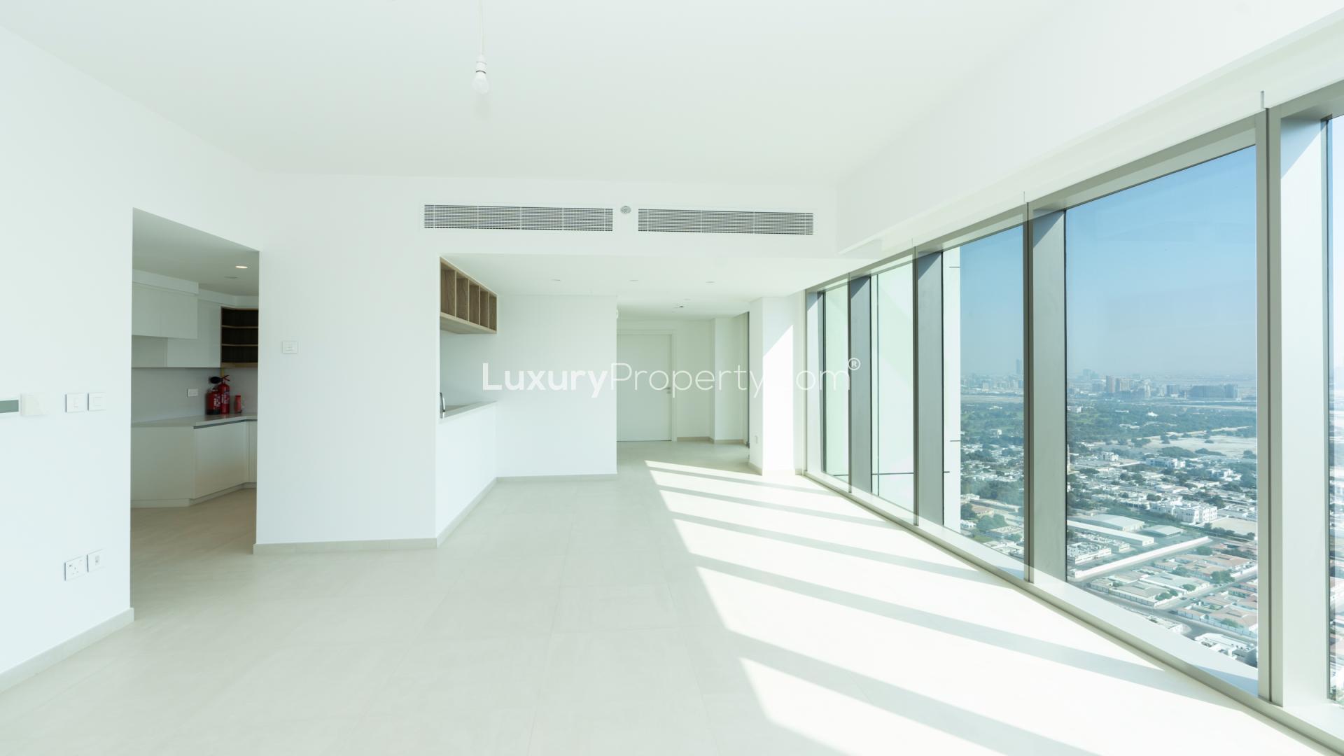 Bright living room with large windows in Downtown Views II, Dubai apartment for rent