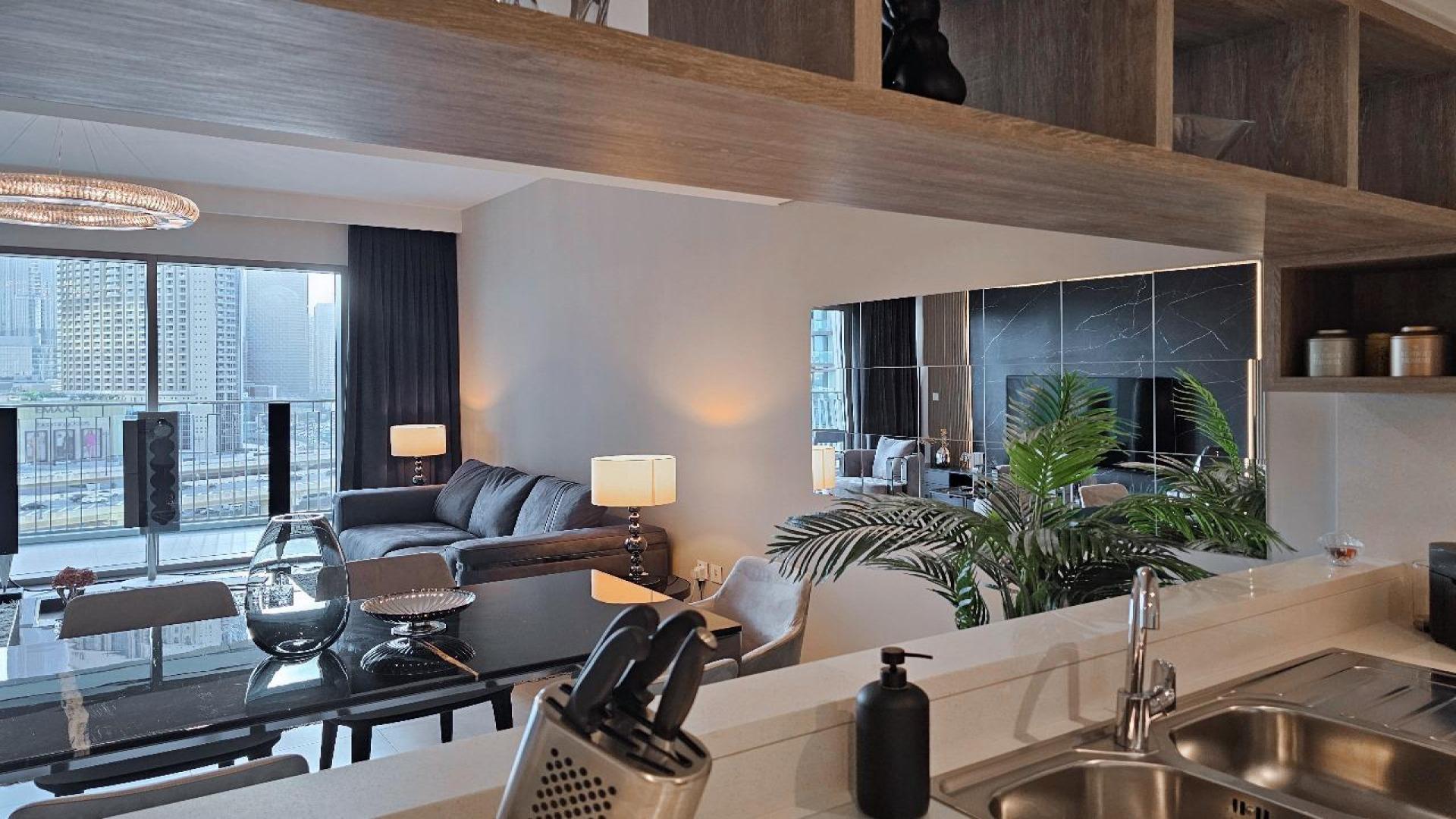 Dining area in fully furnished Downtown Views II apartment, Downtown Dubai, modern design