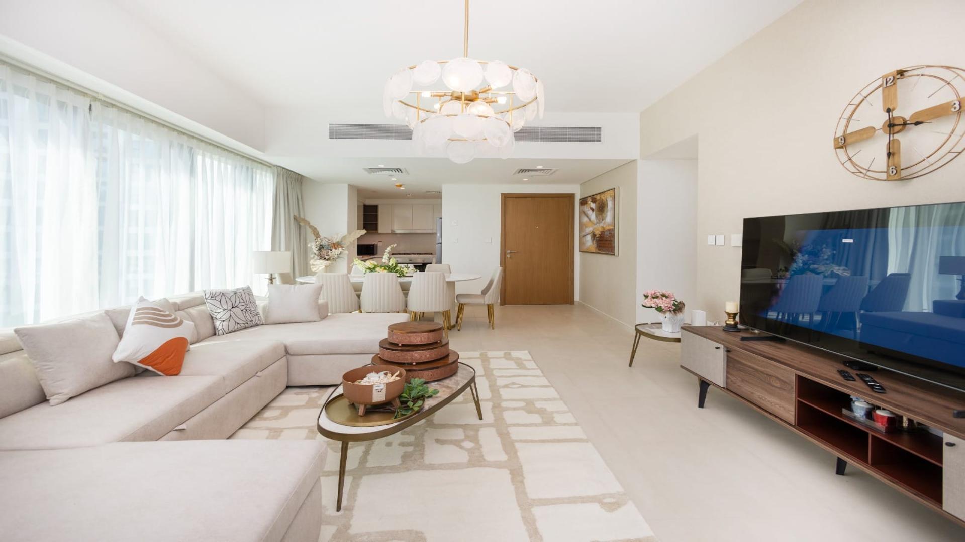 Bright and spacious living room in Downtown Dubai apartment for rent, modern decor and large windows