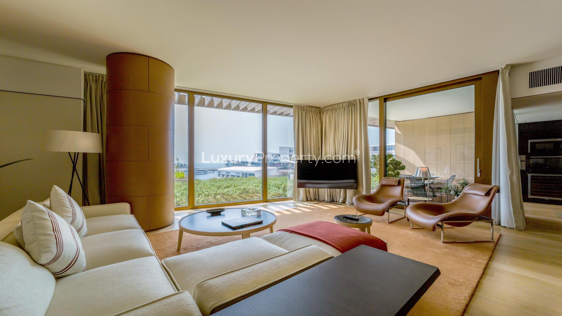 Exclusive Jumeirah Bay Island apartment with sea and marina view, lush green surroundings