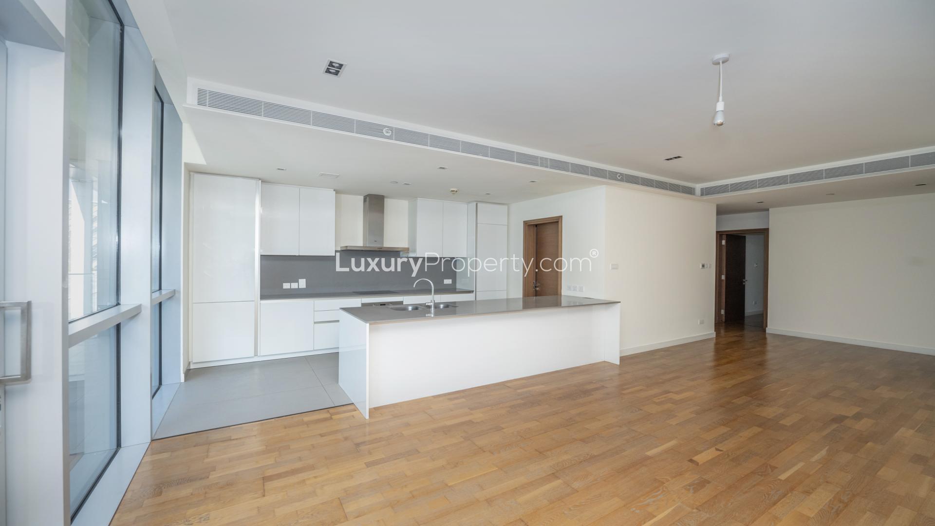 Spacious living room with wooden flooring in City Walk Dubai apartment for rent