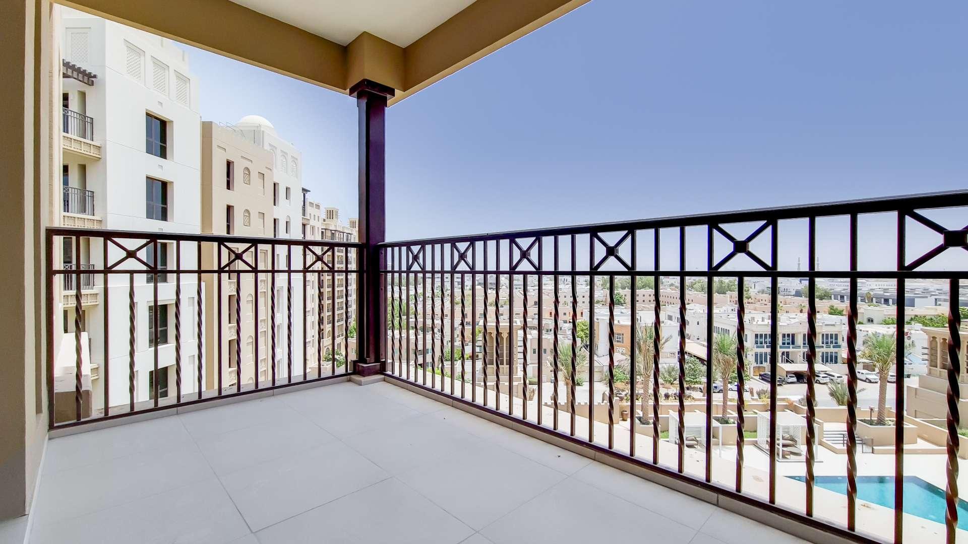 Luxurious Madinat Jumeirah Living apartment interior with large windows and balcony view