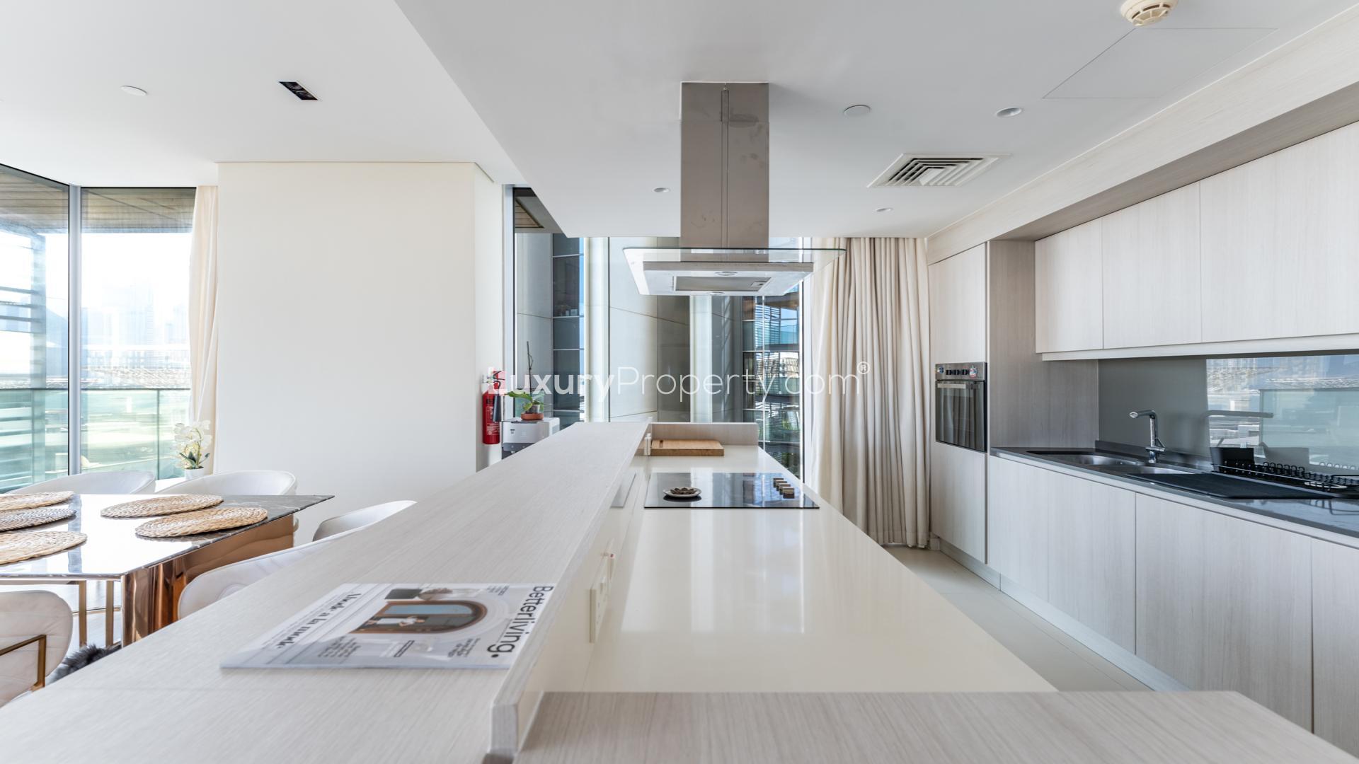 Contemporary open-plan kitchen and living area in Bluewaters apartment for rent