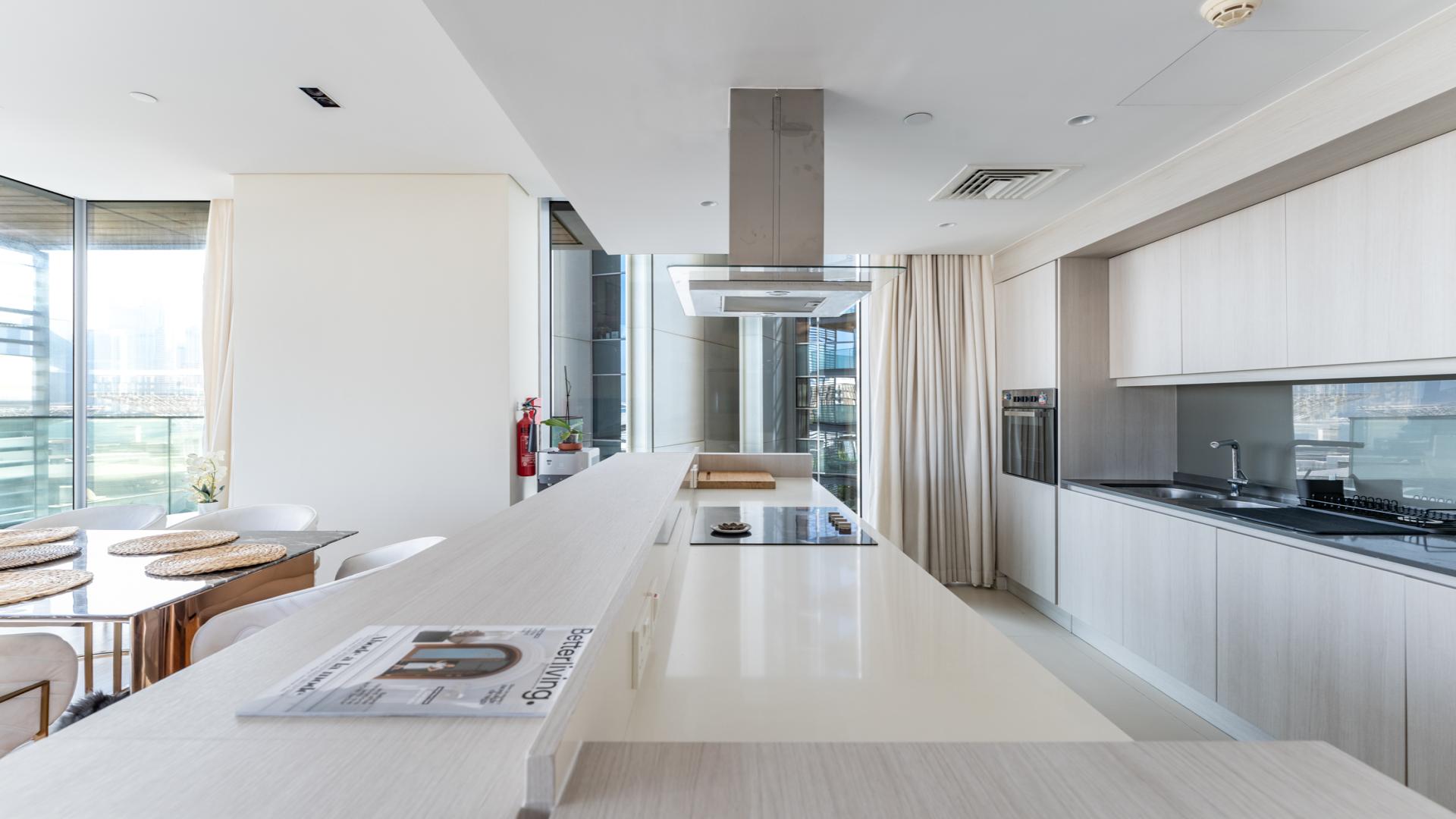 Contemporary open-plan kitchen and living area in Bluewaters apartment for rent