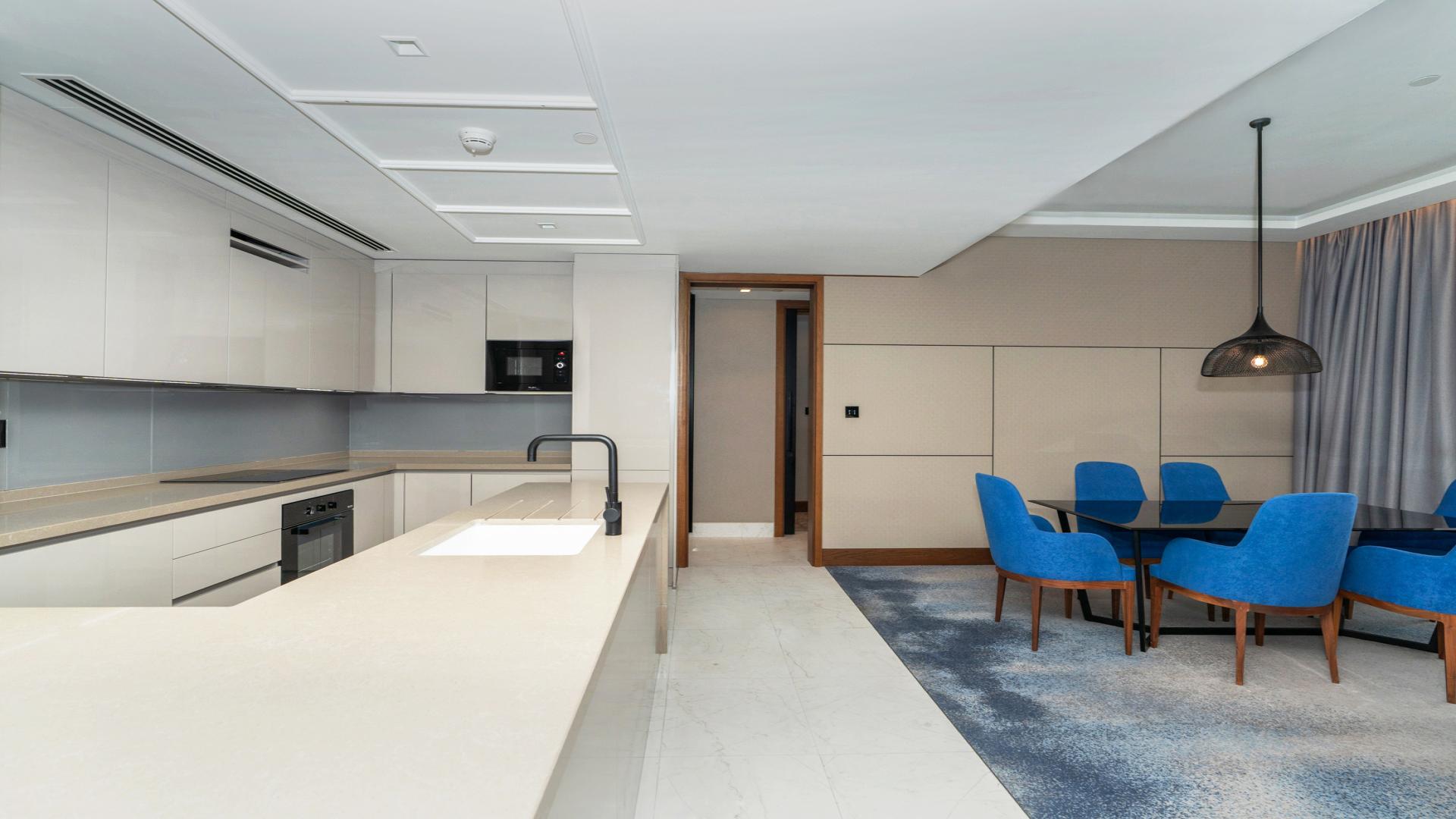 Modern open-plan kitchen and living area in Bluewaters Residences apartment for rent