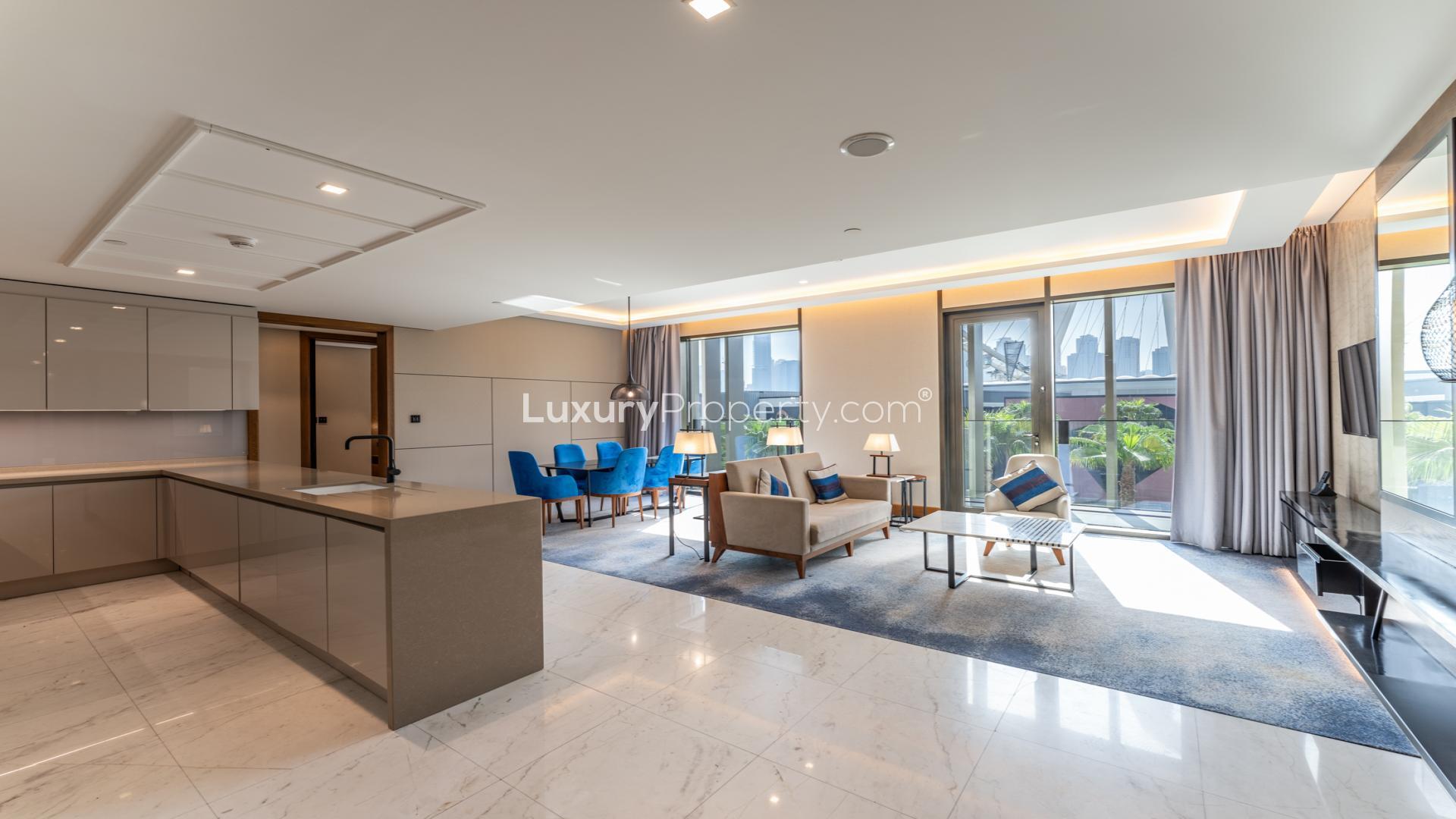 Modern living room in Bluewaters Residences apartment, featuring stylish decor and open layout