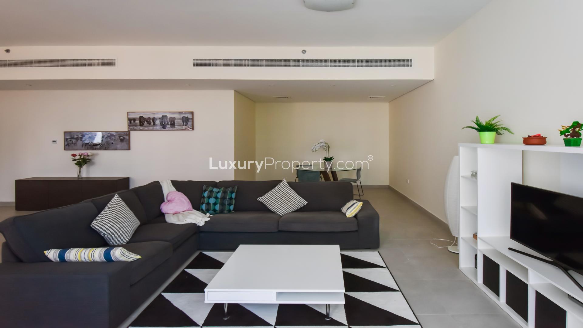 Stylishly furnished living room with marina views in Dubai Marina apartment for rent