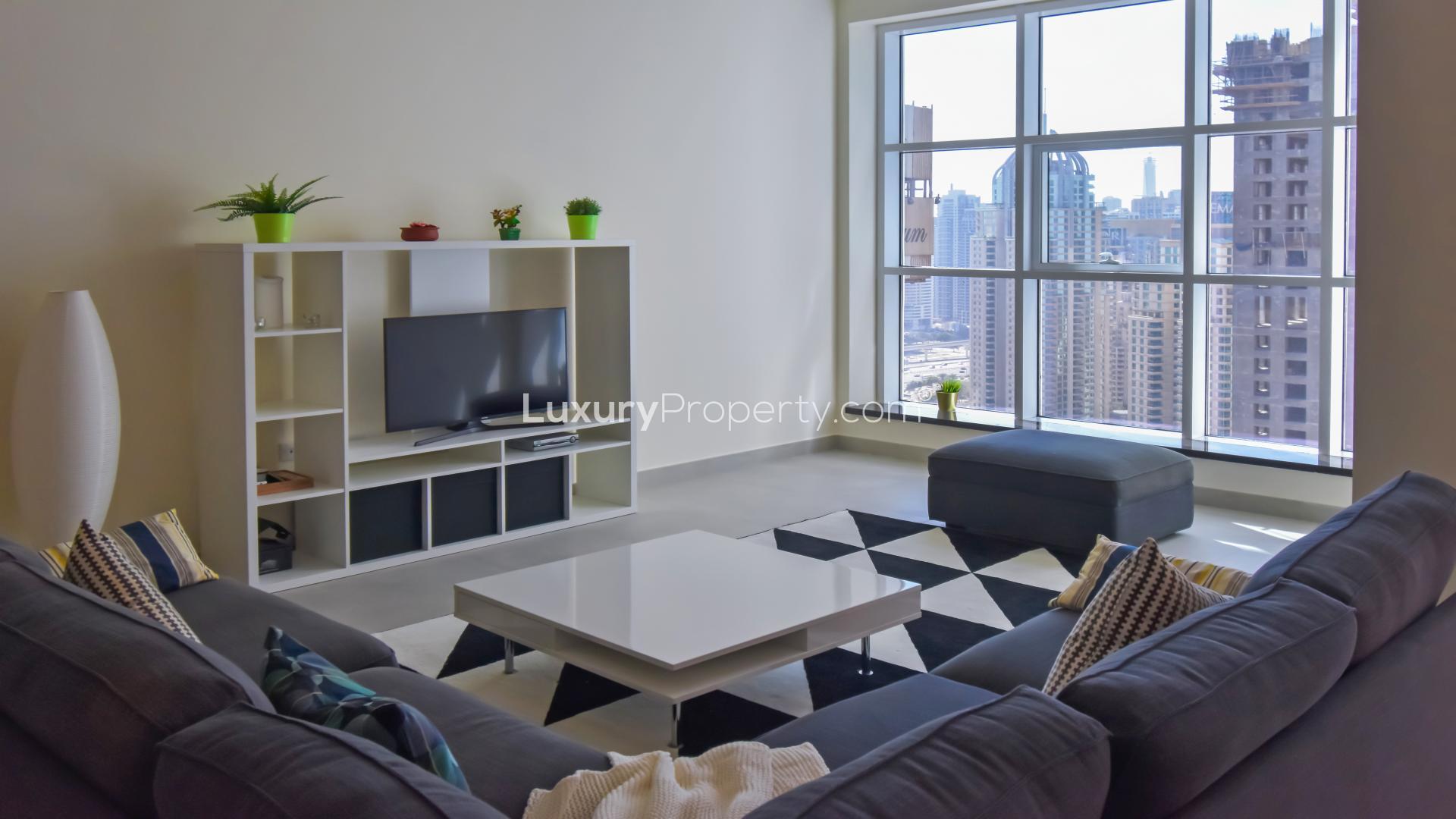 Balcony view from 3-bedroom apartment in Marina Arcade Tower, Dubai Marina, with skyline backdrop