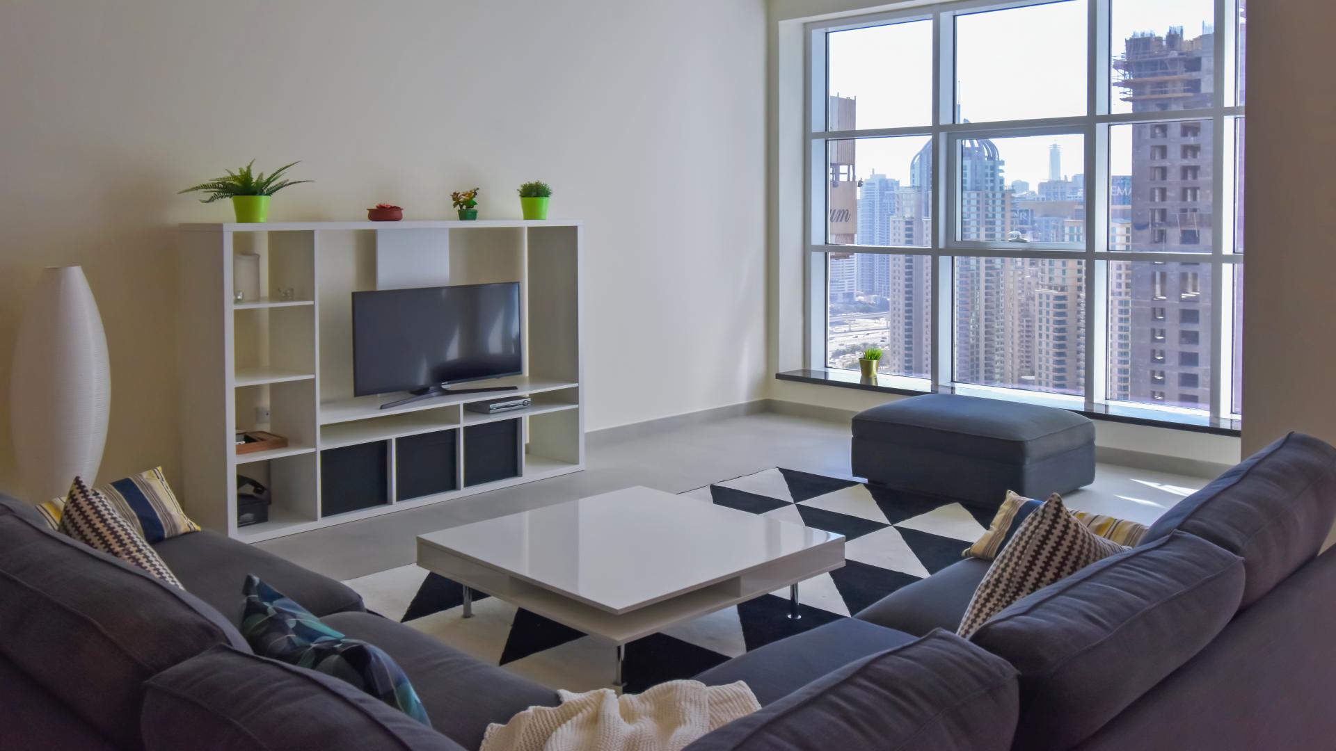 Balcony view from 3-bedroom apartment in Marina Arcade Tower, Dubai Marina, with skyline backdrop