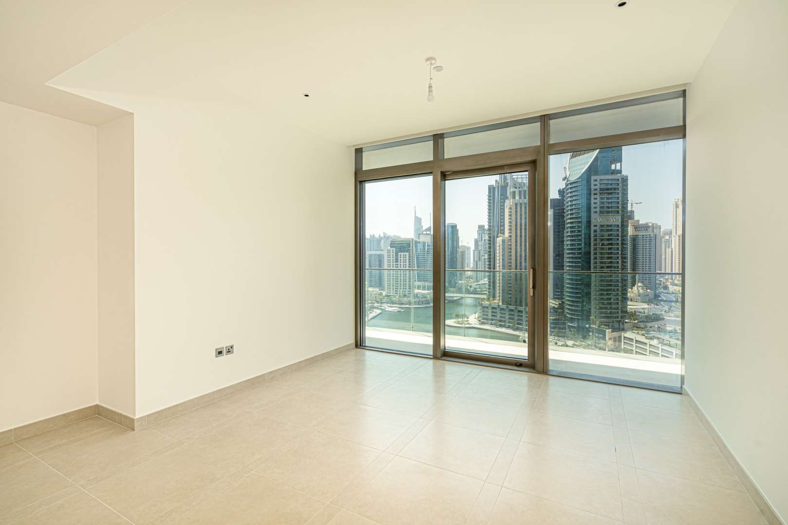 Luxurious balcony view of Dubai Marina skyline from Marina Gate 2 apartment