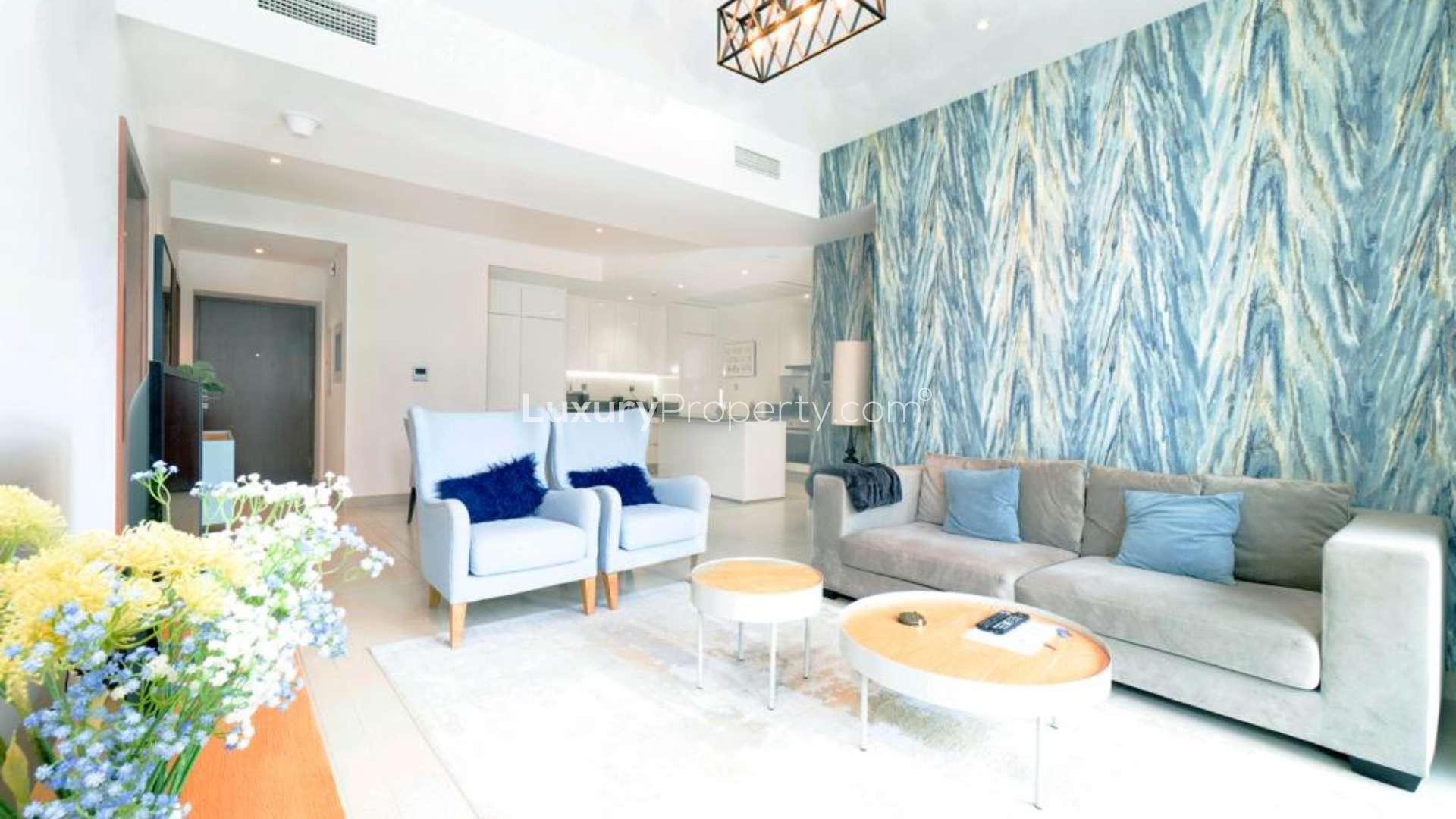 Luxurious furnished apartment balcony with stunning Dubai Marina skyline and waterfront views