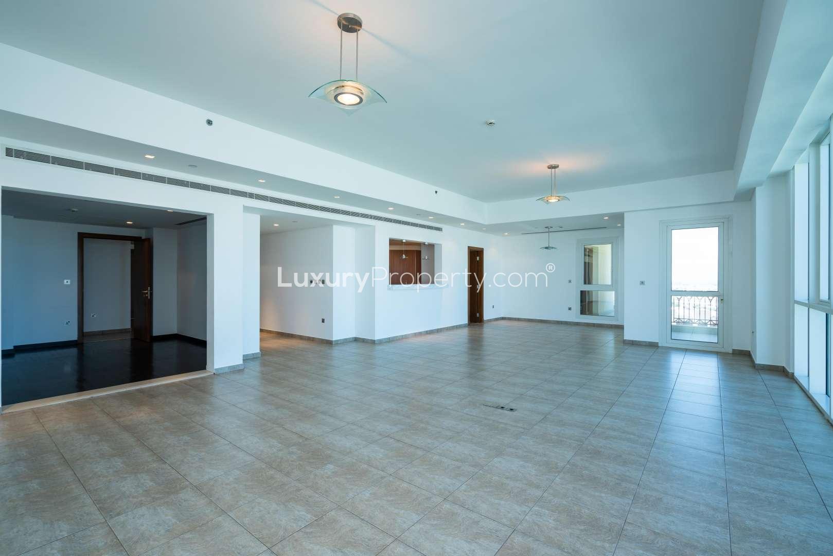 Aerial view of Marina Residences, Palm Jumeirah with waterfront and luxury yachts