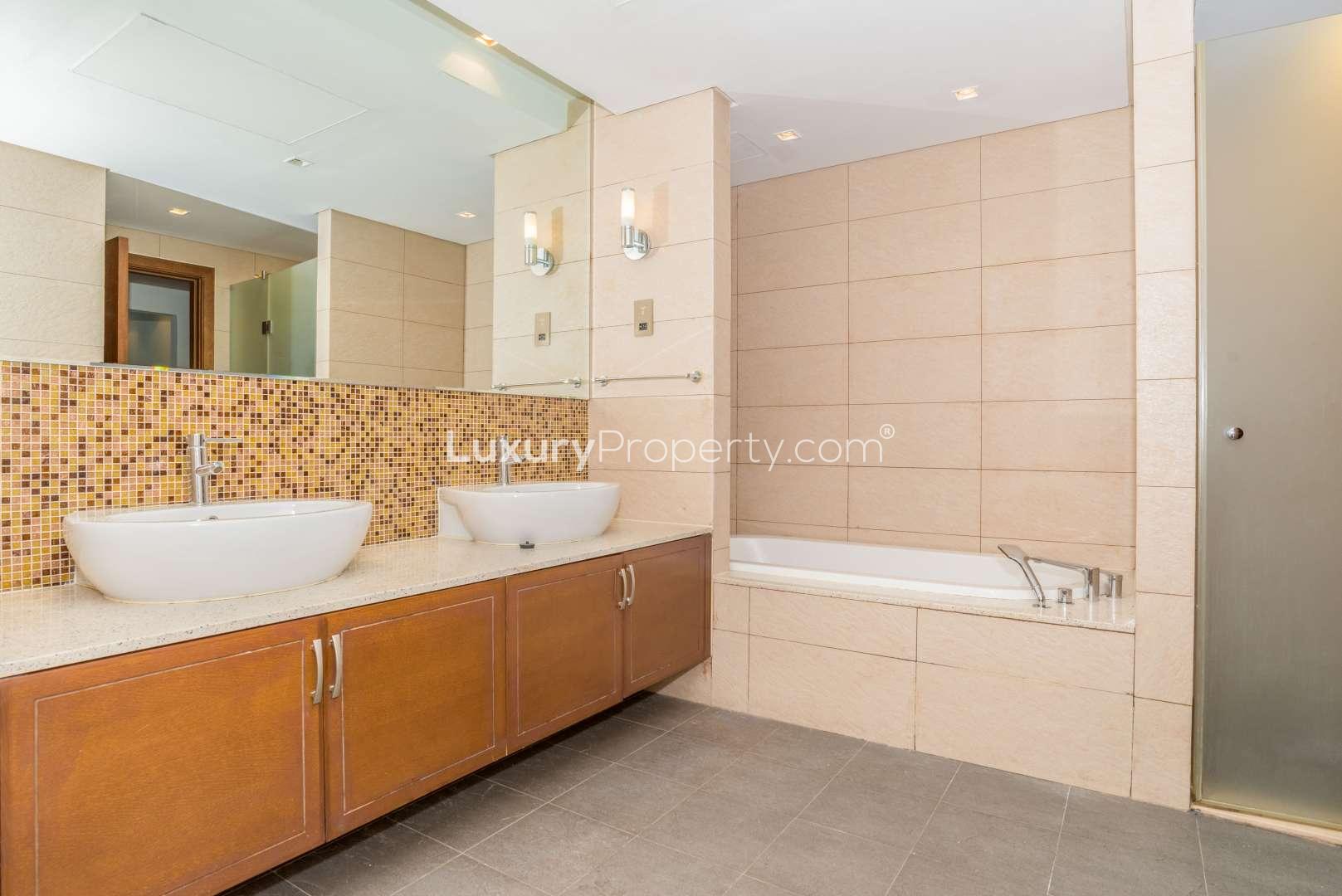 Modern kitchen in three-bedroom apartment, Marina Residence 3, Palm Jumeirah, featuring stainless steel appliances