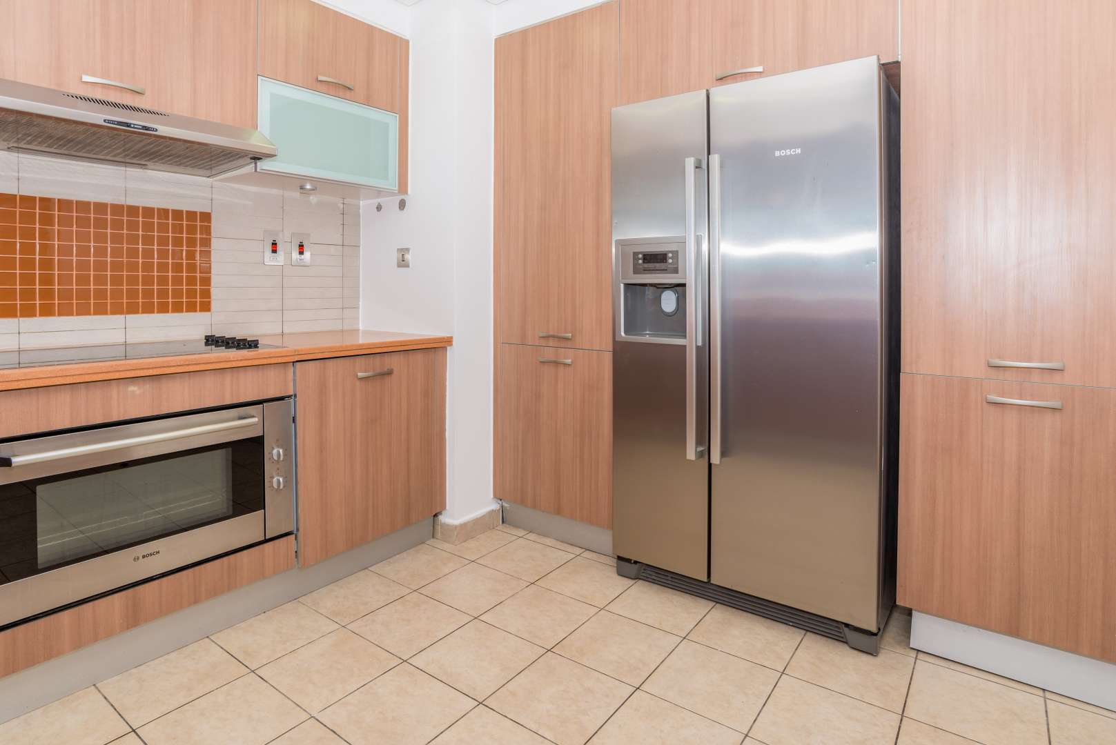 Three-bedroom apartment interior with wooden closets in Marina Residence 3, Palm Jumeirah