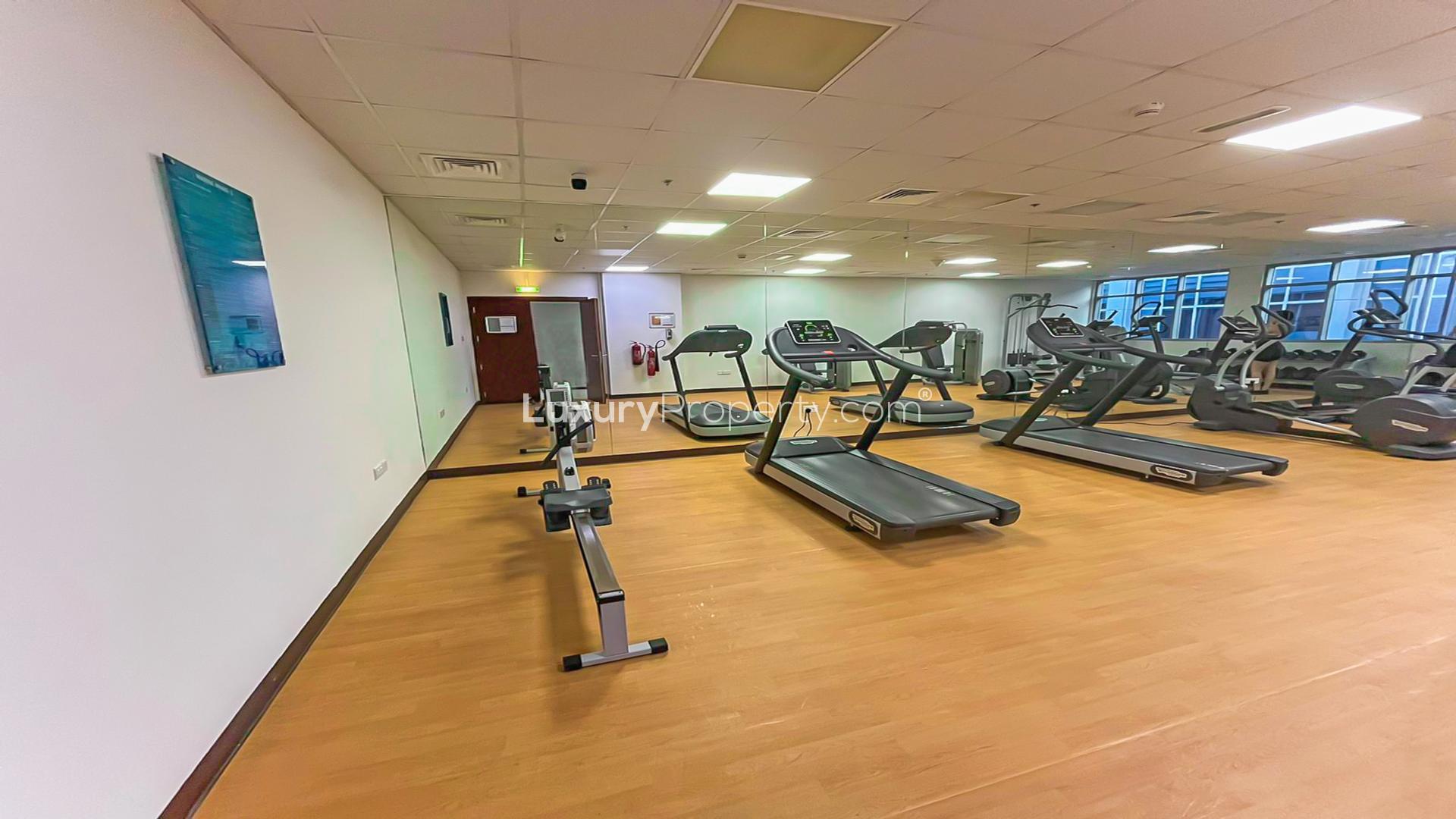 Empty bedroom with built-in wardrobe in Marina Wharf apartment, Dubai Marina