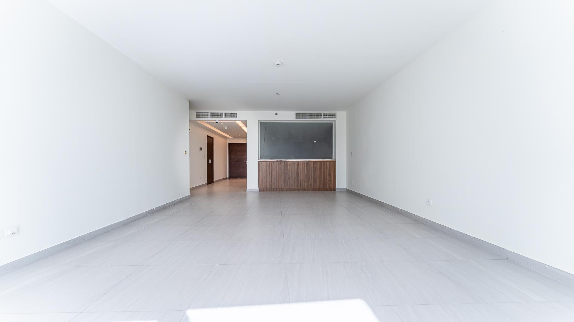 High-floor apartment balcony with cityscape and partial park view in Park Gate, Al Wasl Gate