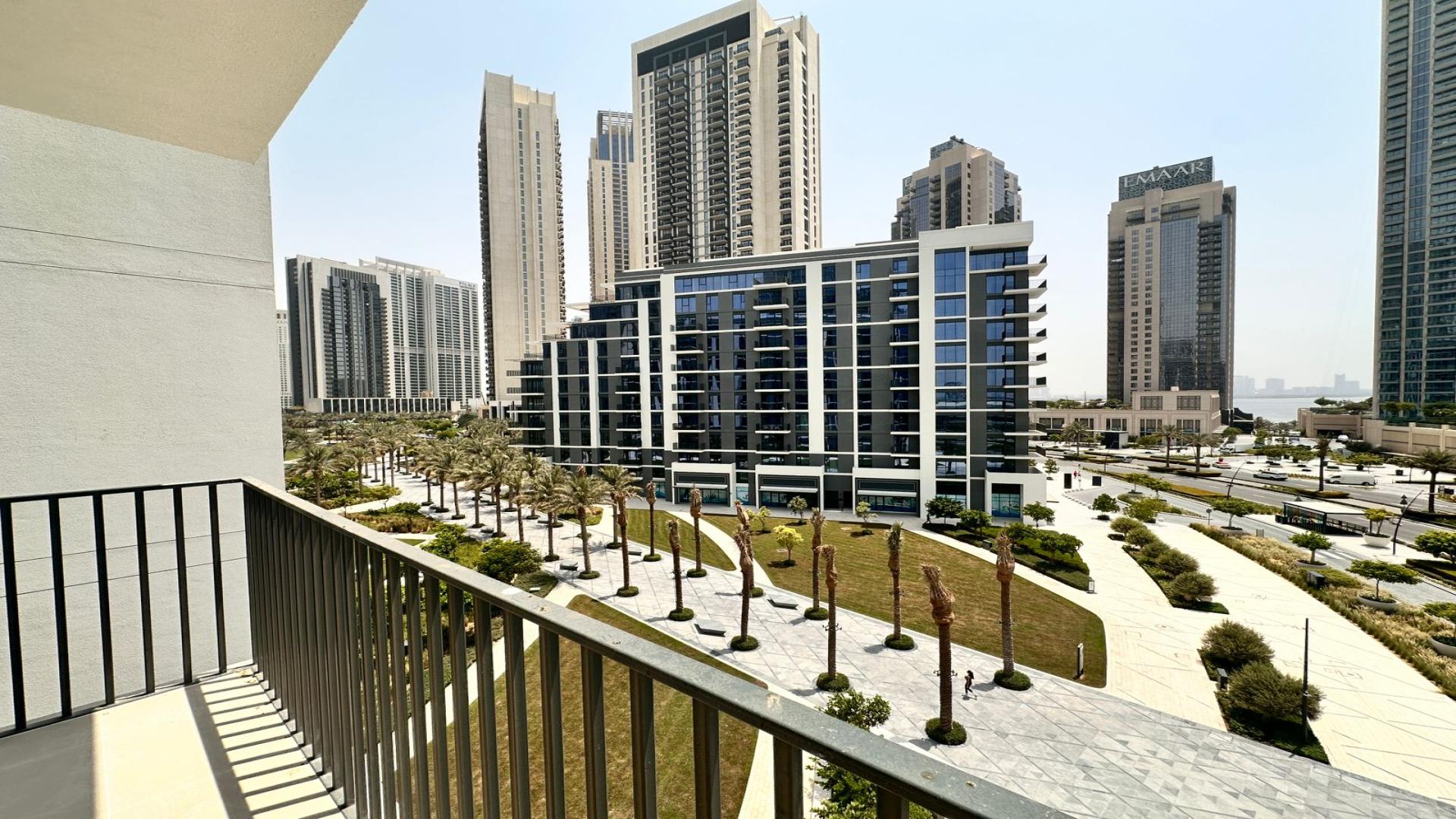 Bright living room with large windows in Dubai Creek Harbour apartment for rent