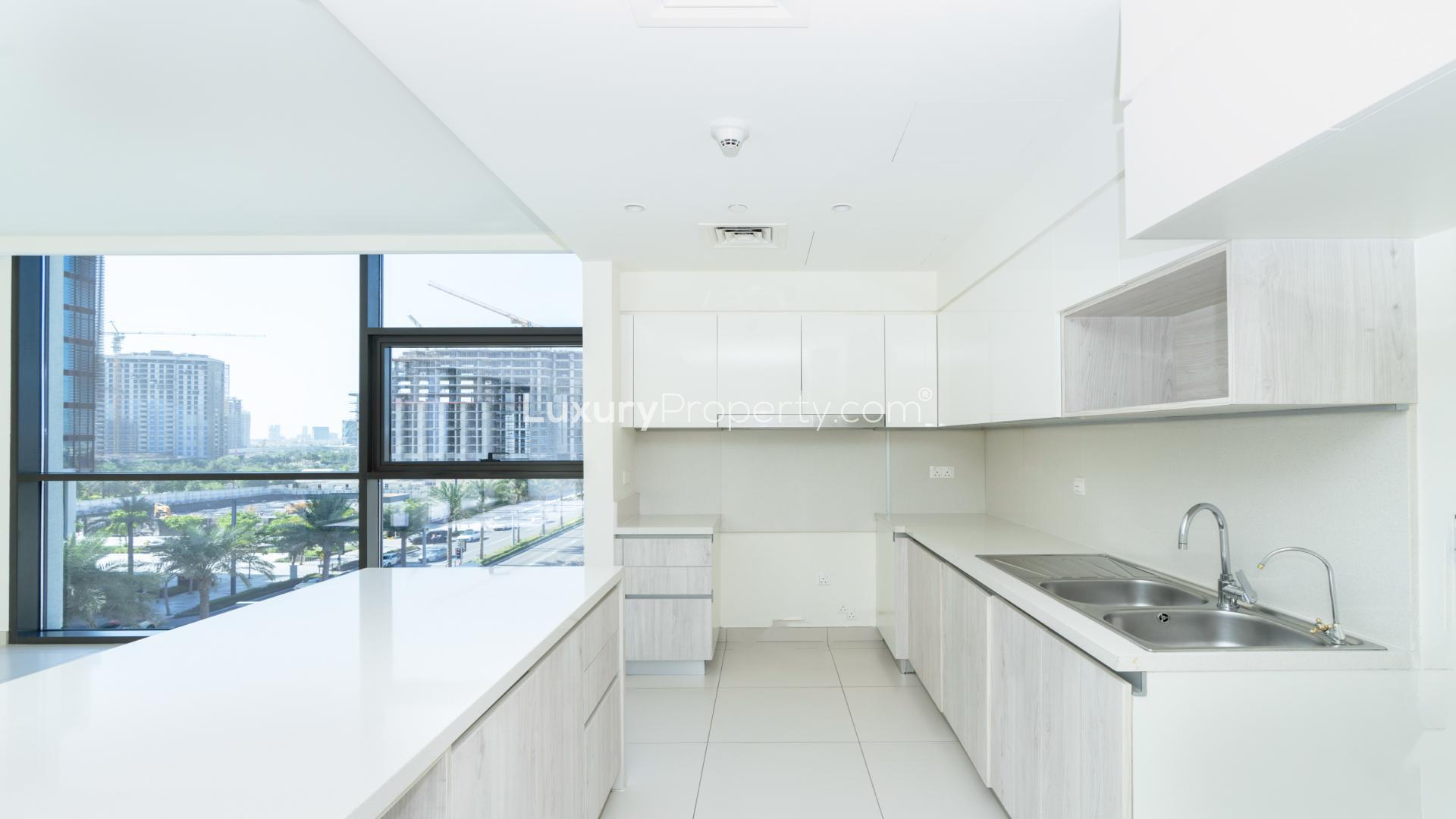 Modern kitchen in 3-bedroom apartment, Park Point, Dubai Hills Estate, with city view