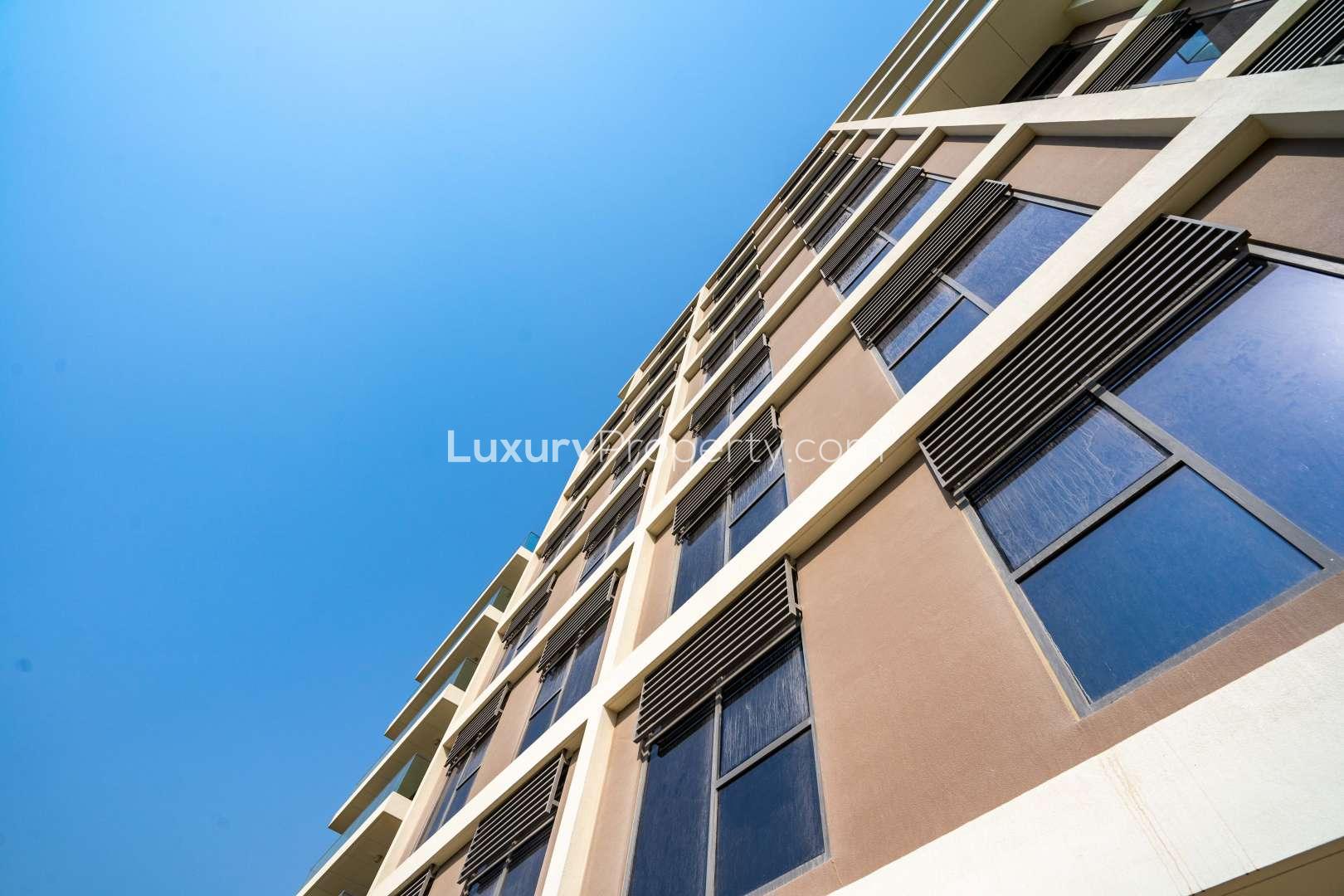 Modern apartment buildings in Dubai Hills Estate's Park Heights community with landscaped surroundings