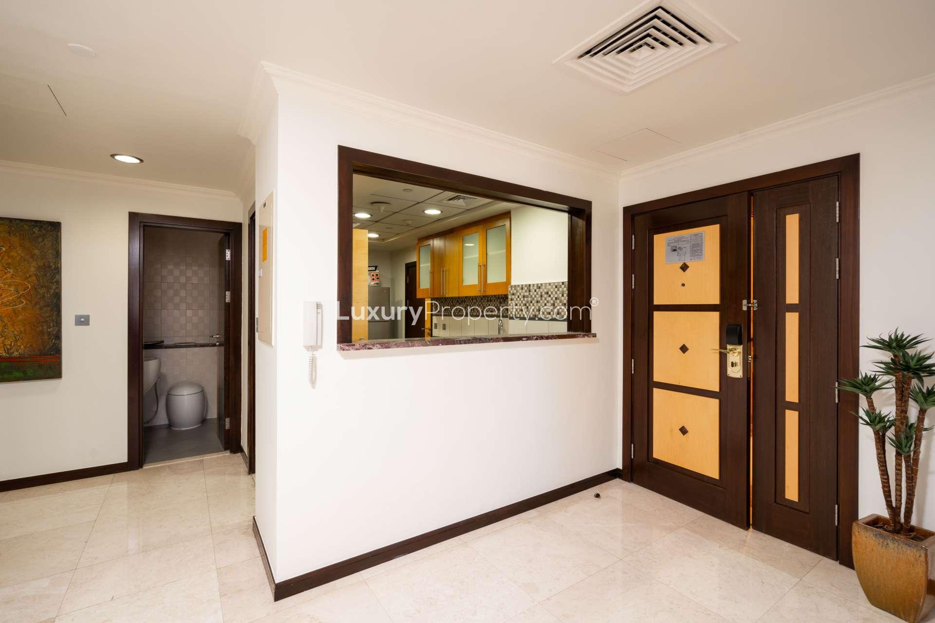 Elegant living and dining area in 3-bedroom apartment, Murjan 4, Jumeirah Beach Residence