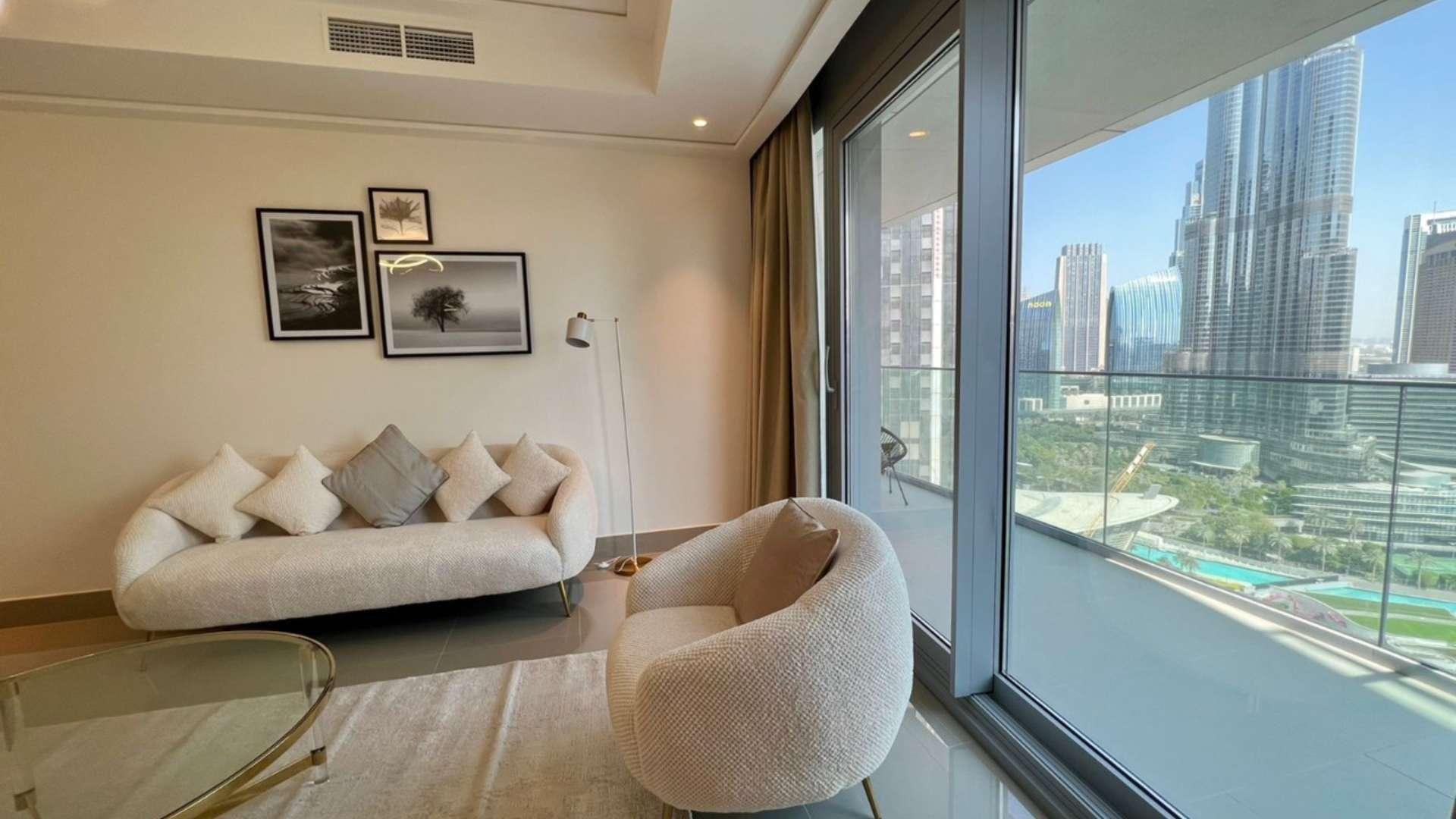 Modern living room in high-floor apartment with Burj Khalifa views, Downtown Dubai