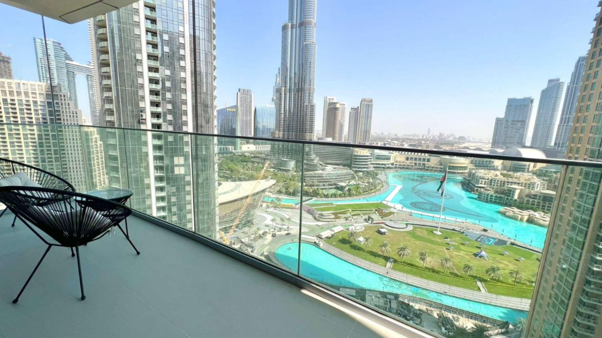 Modern living and dining area in luxury Downtown Dubai apartment, Burj Khalifa view