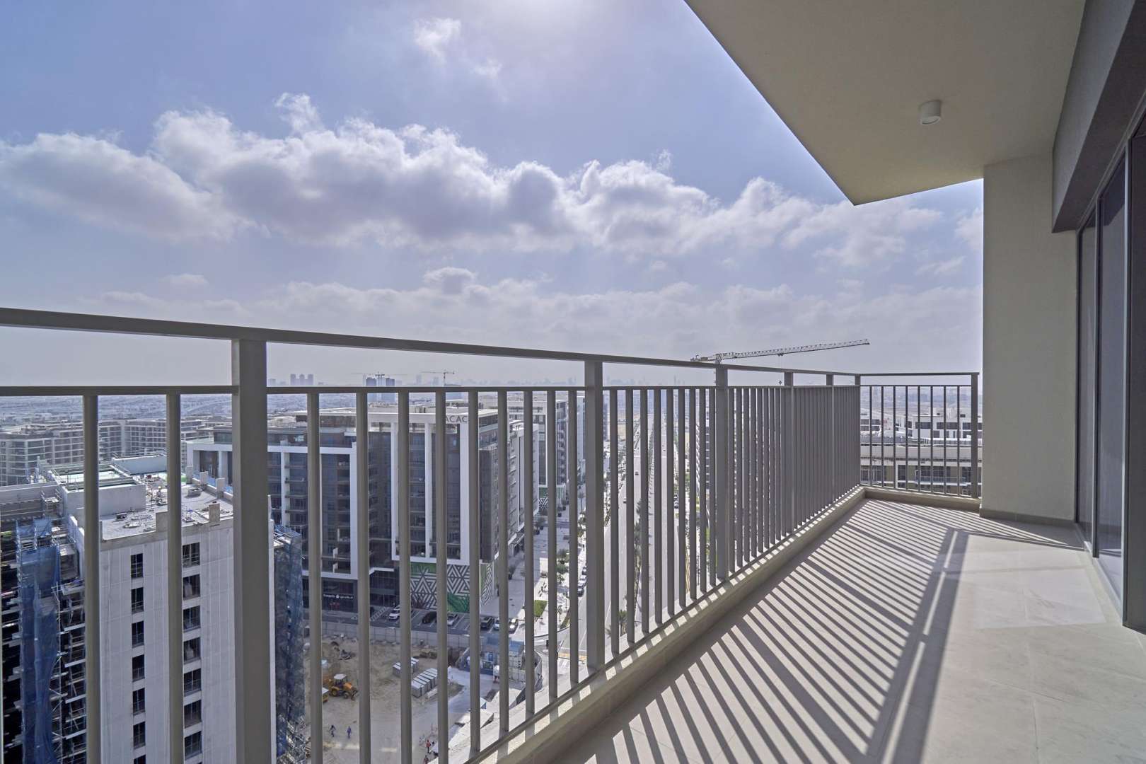 Bright living area with large windows in Park Heights I, Dubai Hills Estate apartment