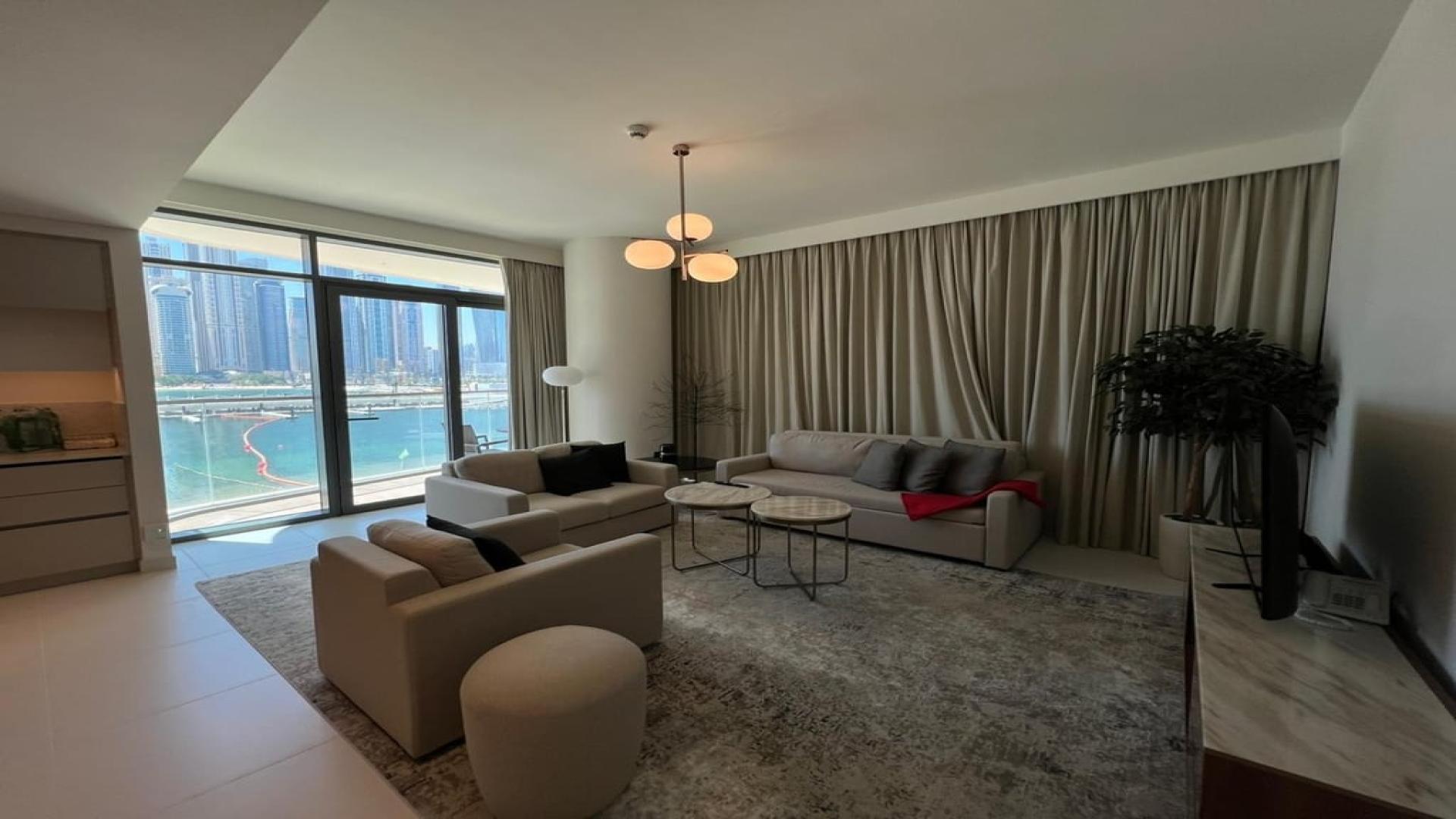 Furnished apartment balcony with stunning marina view in Emaar Beachfront, Dubai Harbour