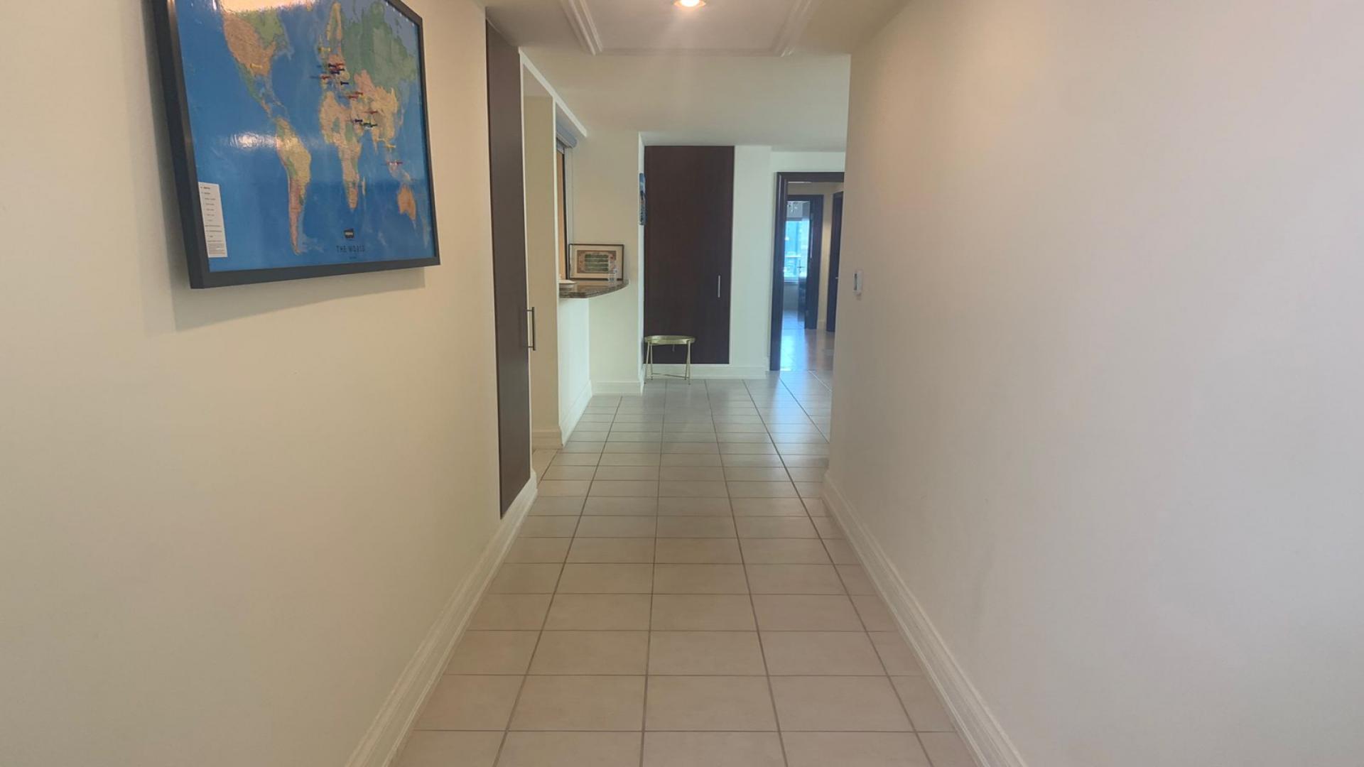 View from Al Anbar Tower apartment in Dubai Marina, showcasing city skyline and greenery