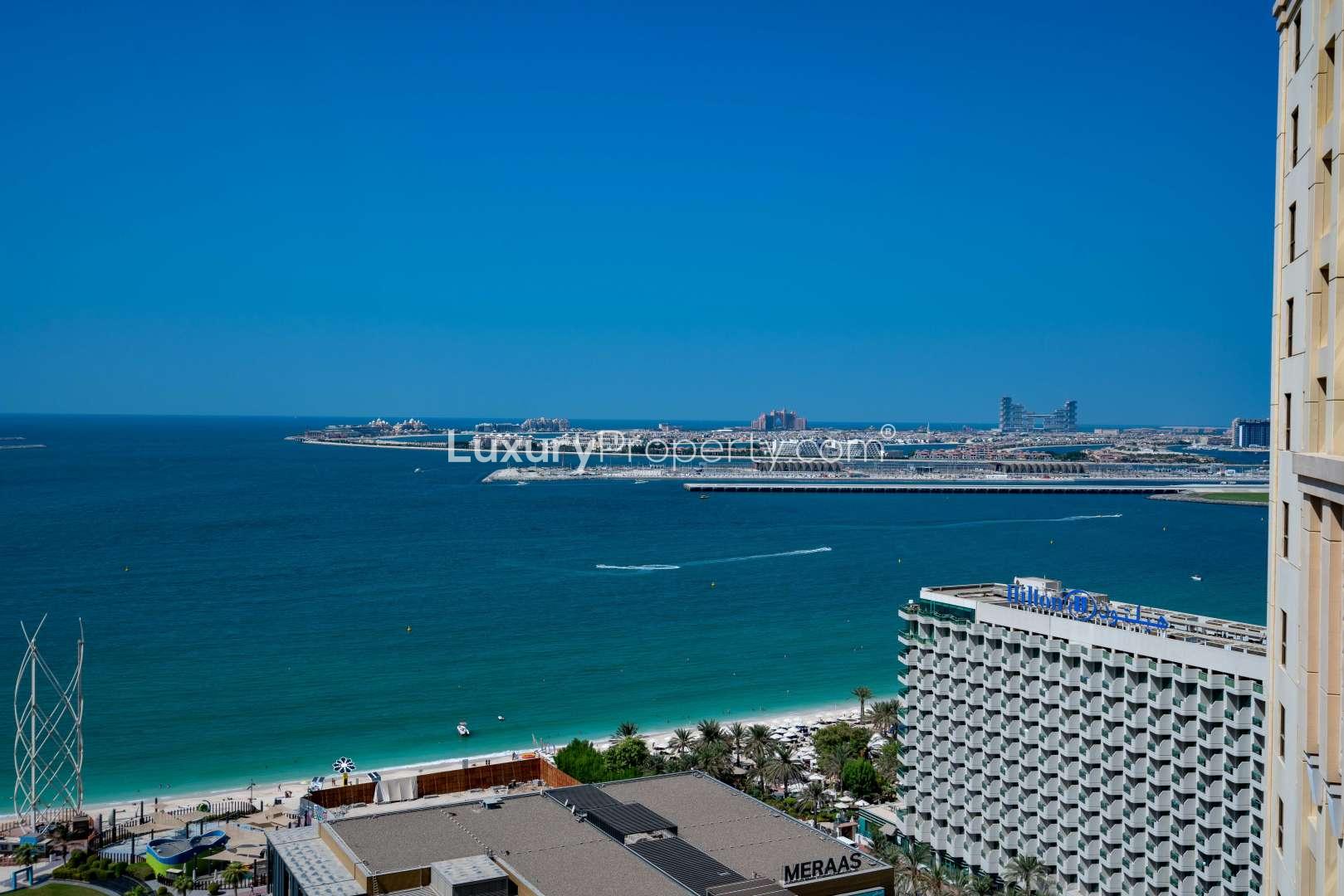 Luxurious JBR apartment with stunning sea and Ferris wheel view from living room window