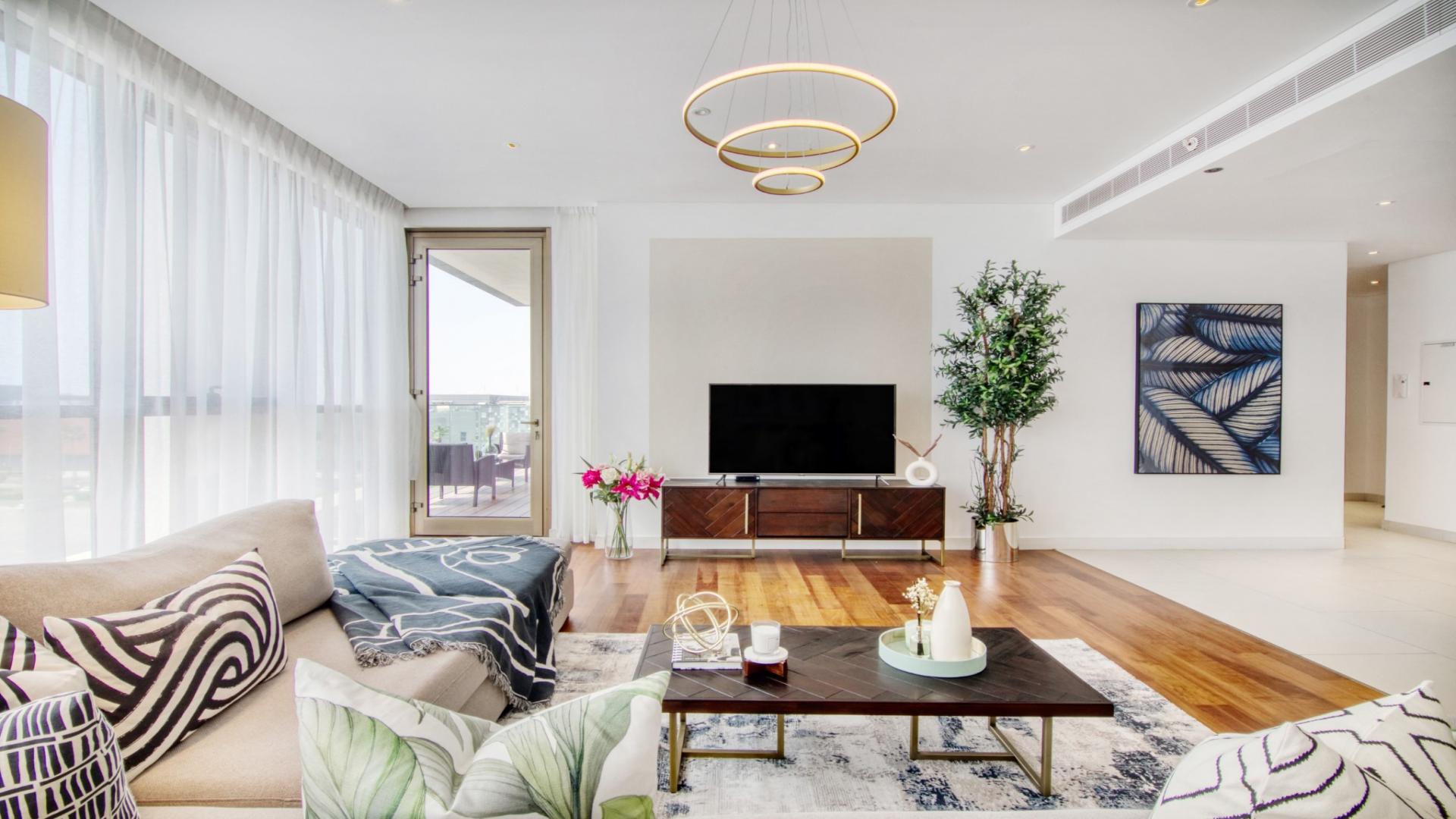 Modern living room in City Walk apartment, spacious layout with natural light and stylish decor