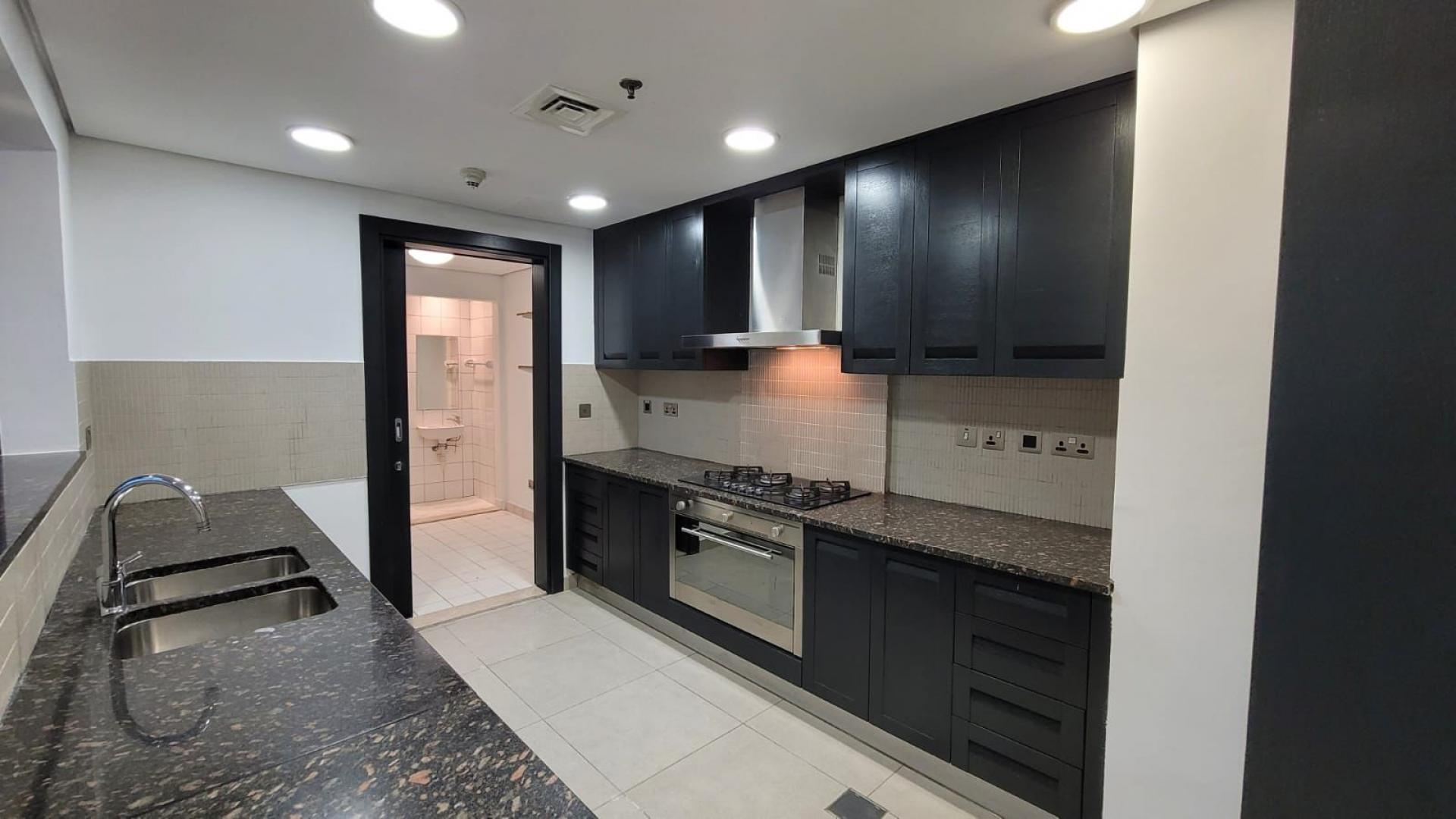 Modern kitchen in 3-bed duplex apartment, Jumeirah Heights, Cluster E, available for rent