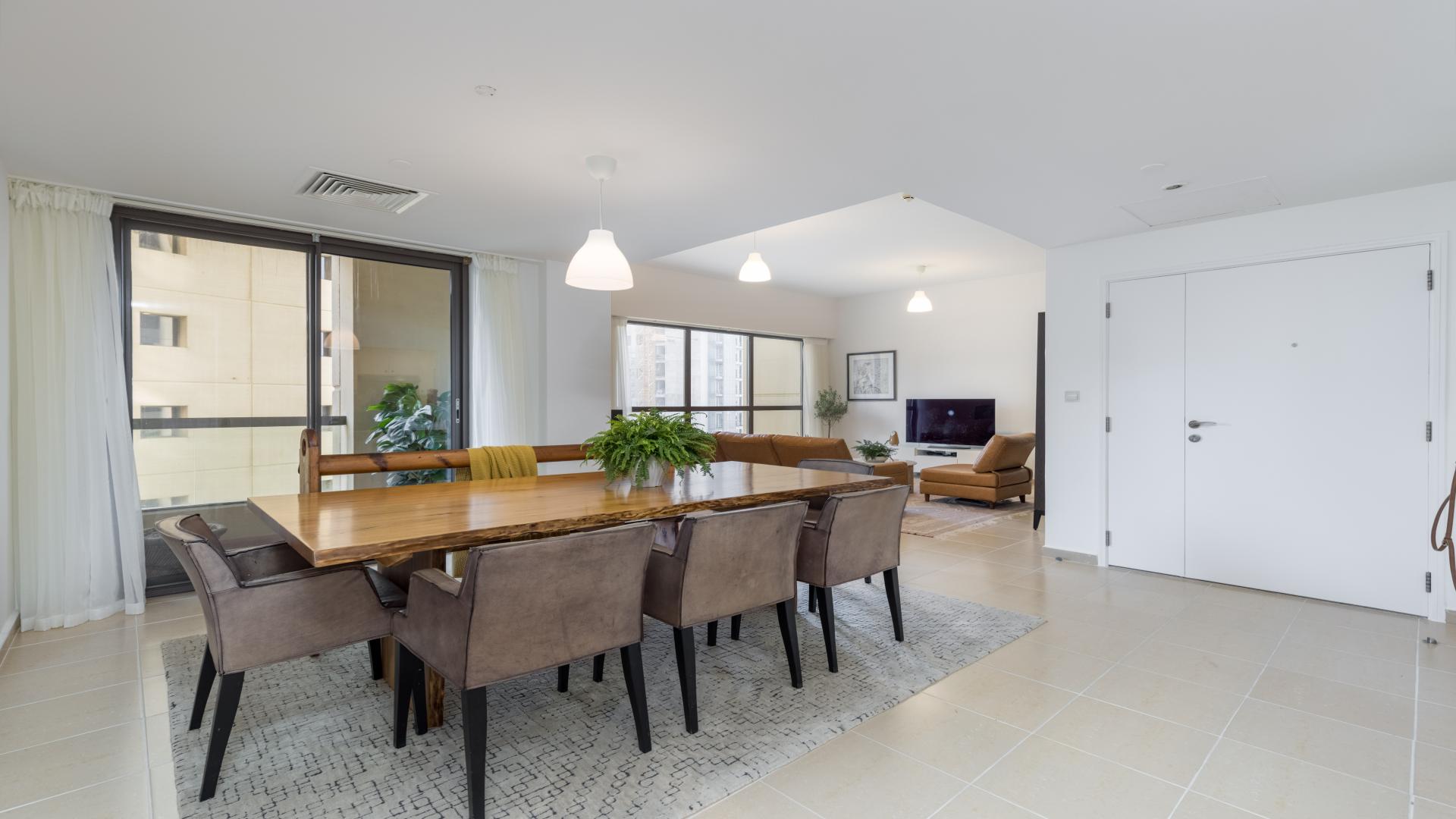 Luxurious living room in JBR Sadaf apartment with modern furniture and decor