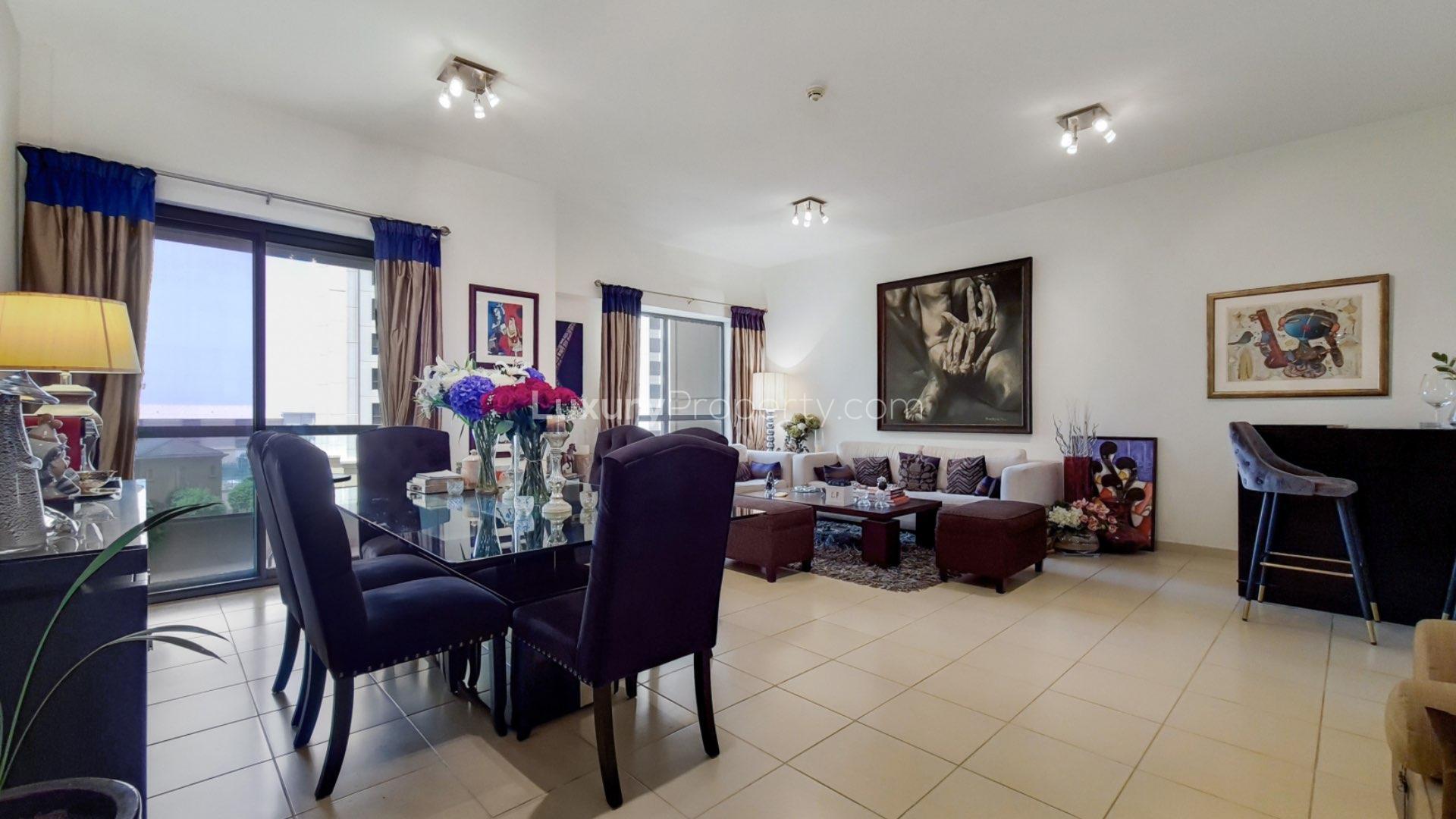 Open plan living area with partial sea view in Jumeirah Beach Residence apartment