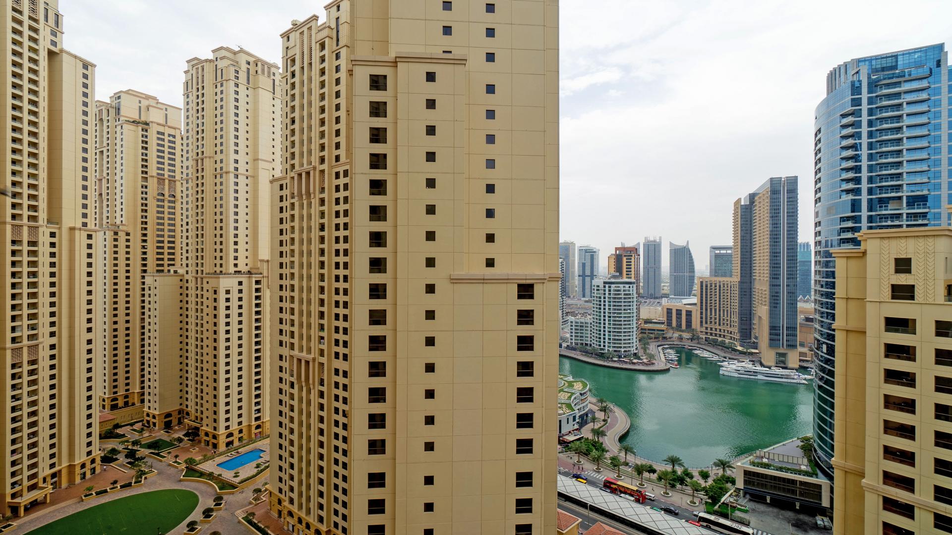 "Balcony view from 3-bedroom apartment in Sadaf, JBR, showcasing marina and skyscrapers.","Stunning marina view from 3-bedroom apartment in Sadaf, JBR, Dubai for rent.",Marina view from 3-bedroom apartment in Sadaf, JBR, Dubai, for rent. Stunning skyline