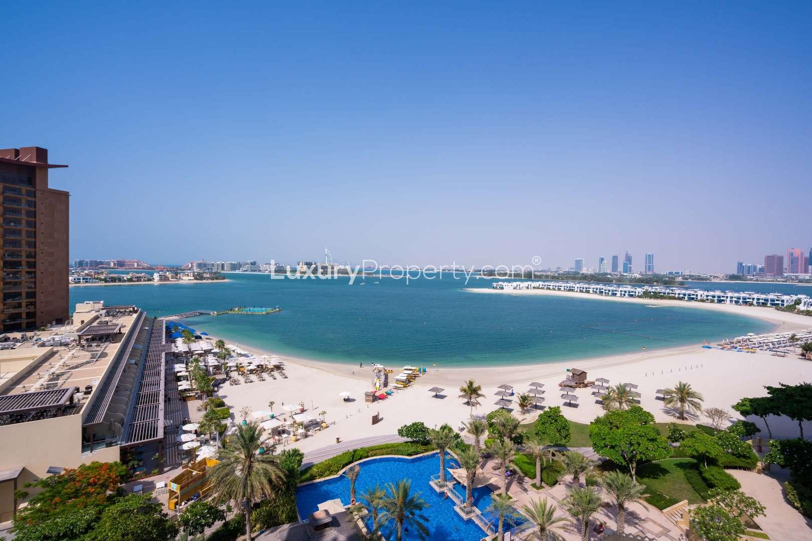 Aerial view of Shoreline Apartments beach and pool in Palm Jumeirah, Dubai