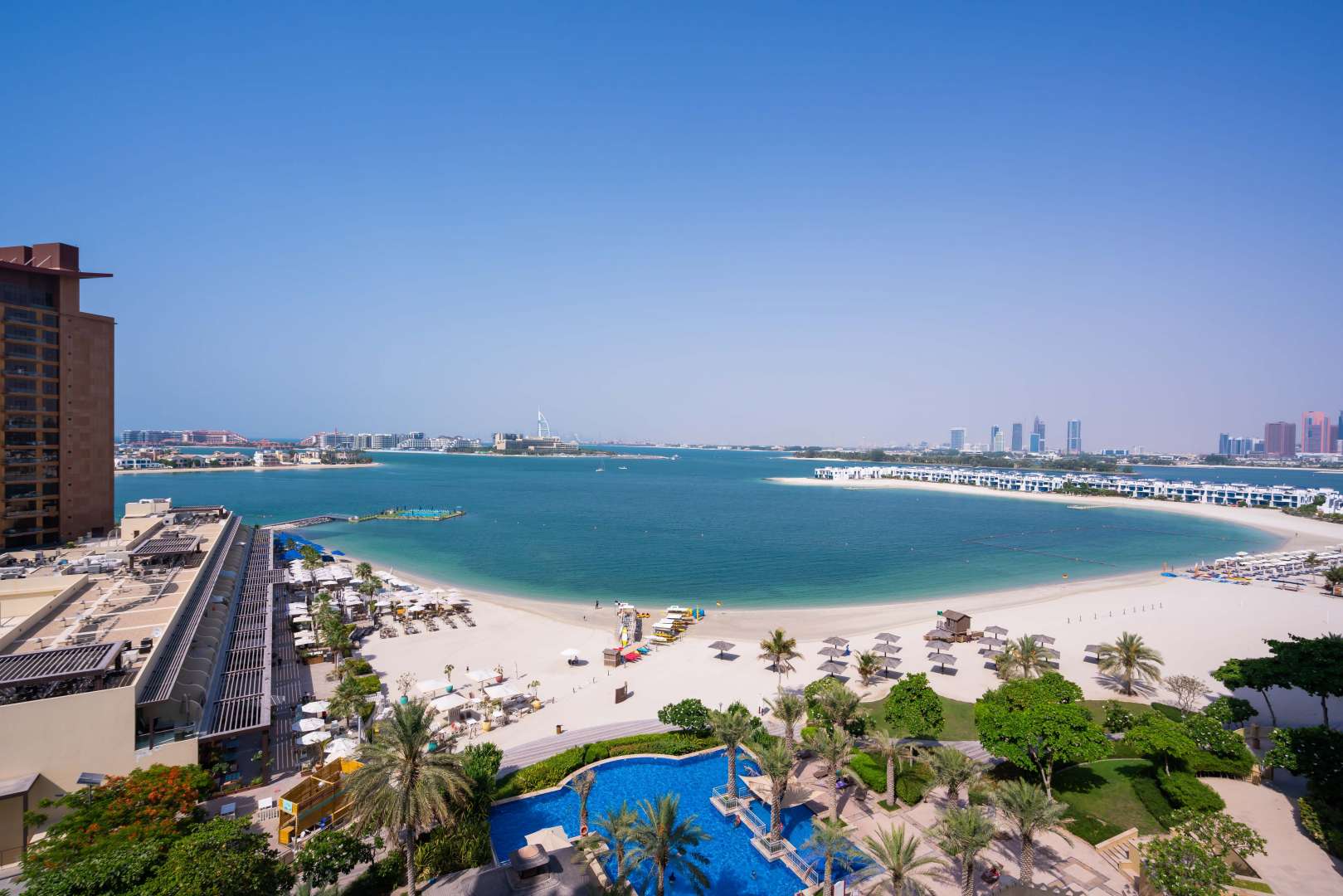 Aerial view of Shoreline Apartments beach and pool in Palm Jumeirah, Dubai